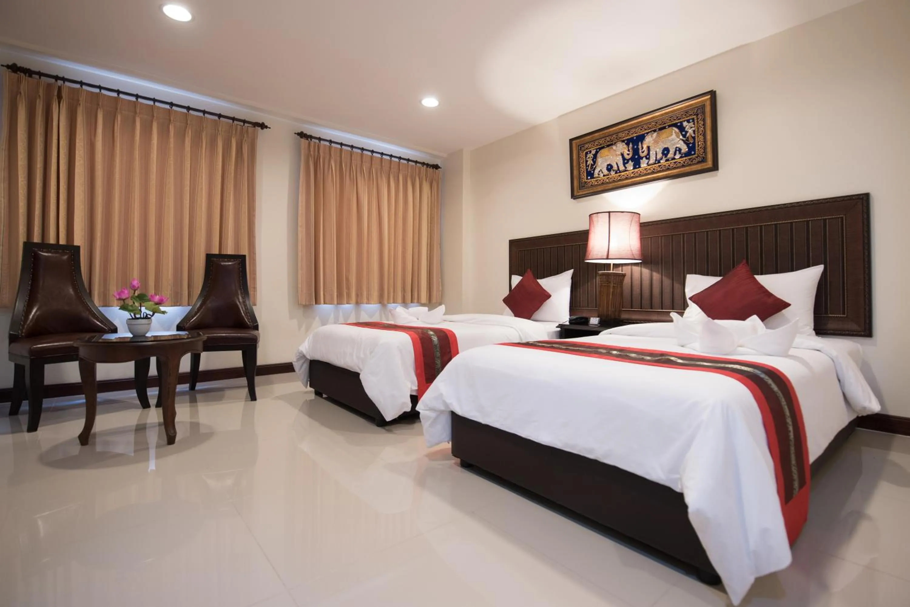 Bed in True Siam Rangnam Hotel