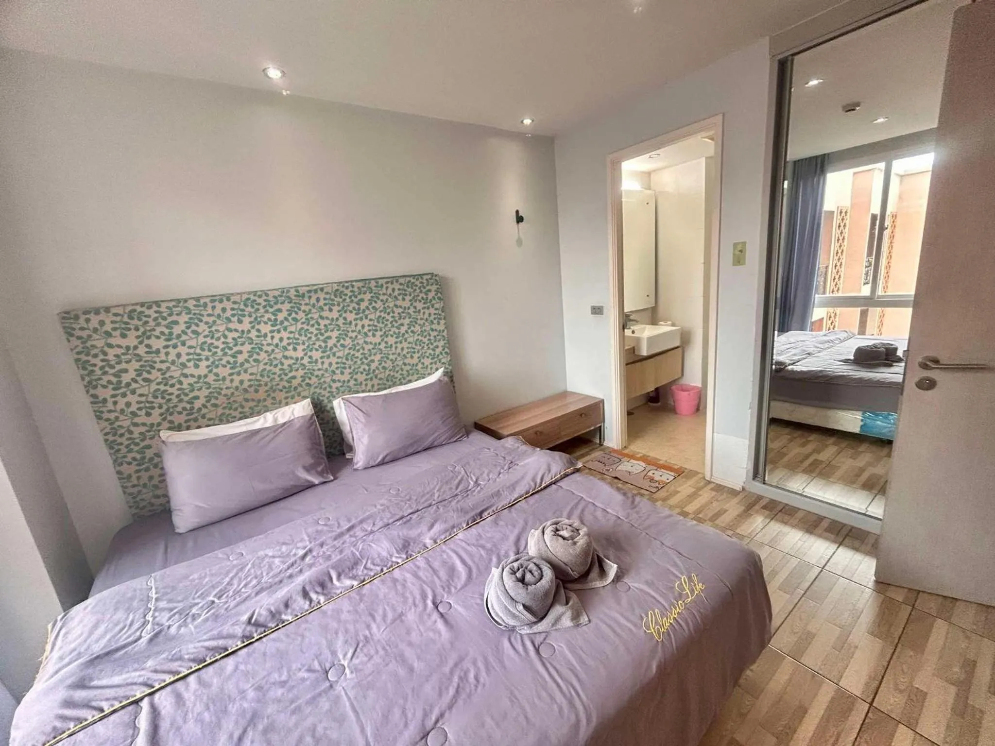 Bed in Atlantic Condo Resort Pattaya by Panisara