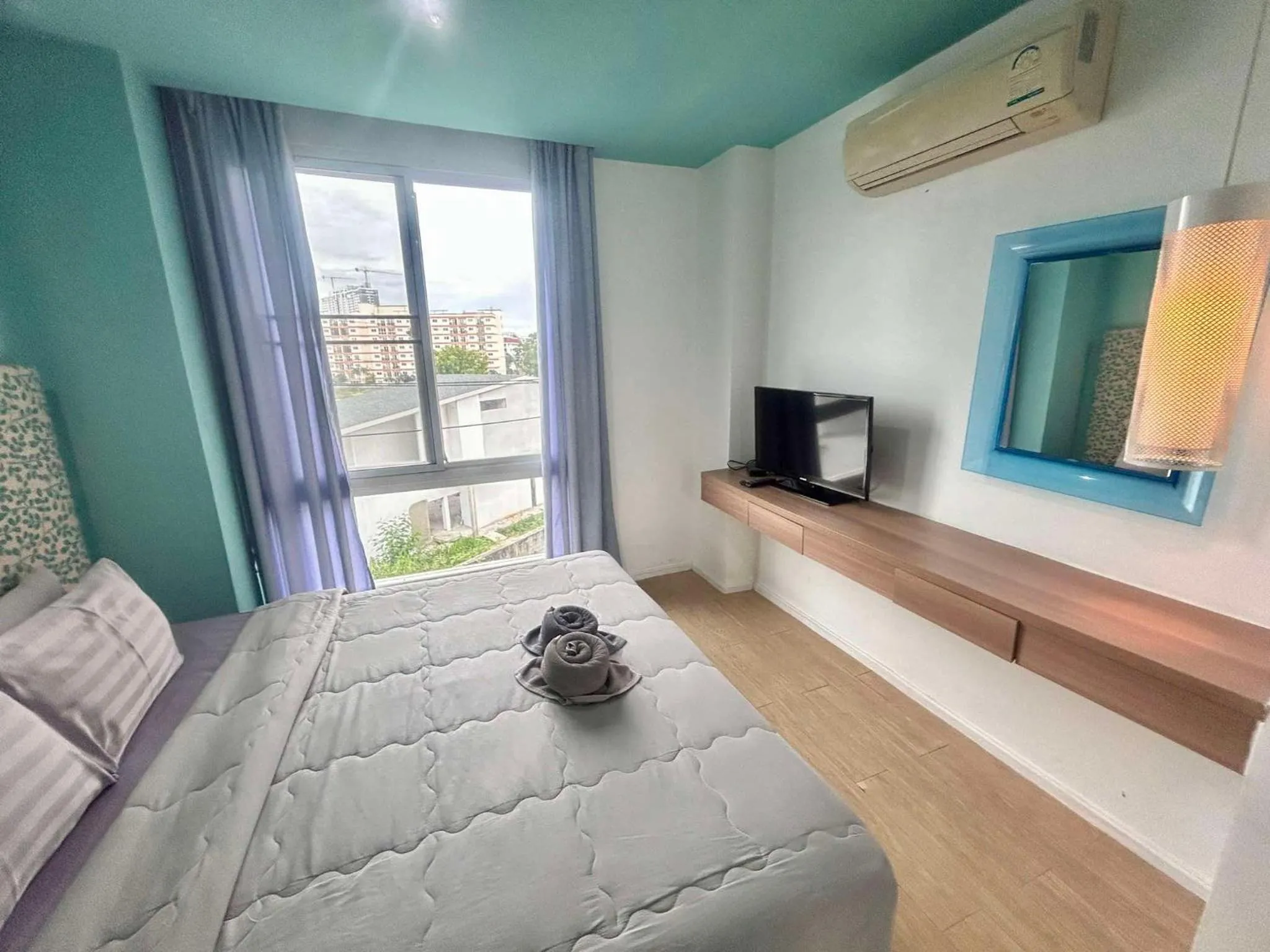 Bed in Atlantic Condo Resort Pattaya by Panisara