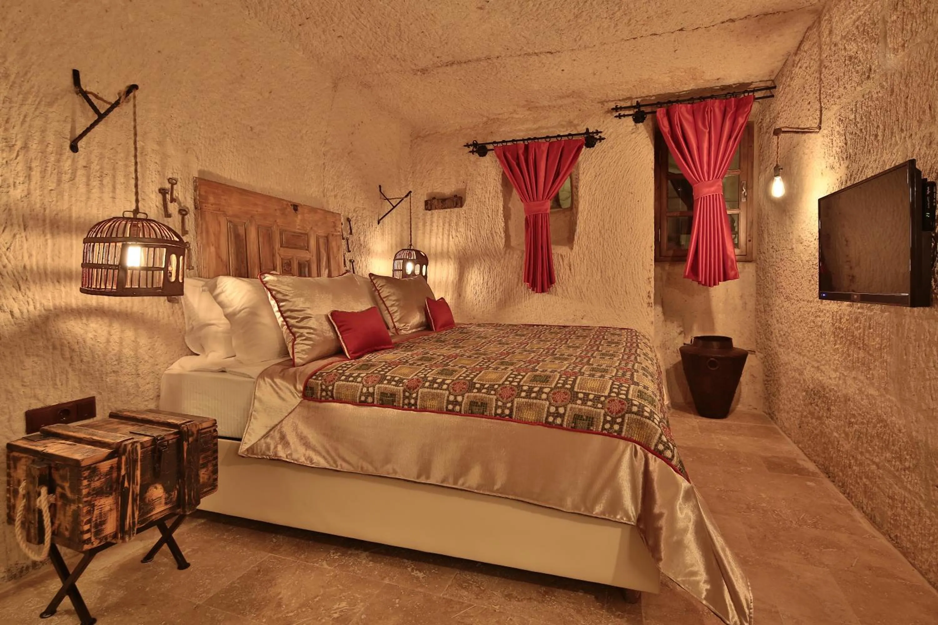 Bed in The Owl Cave Hotel