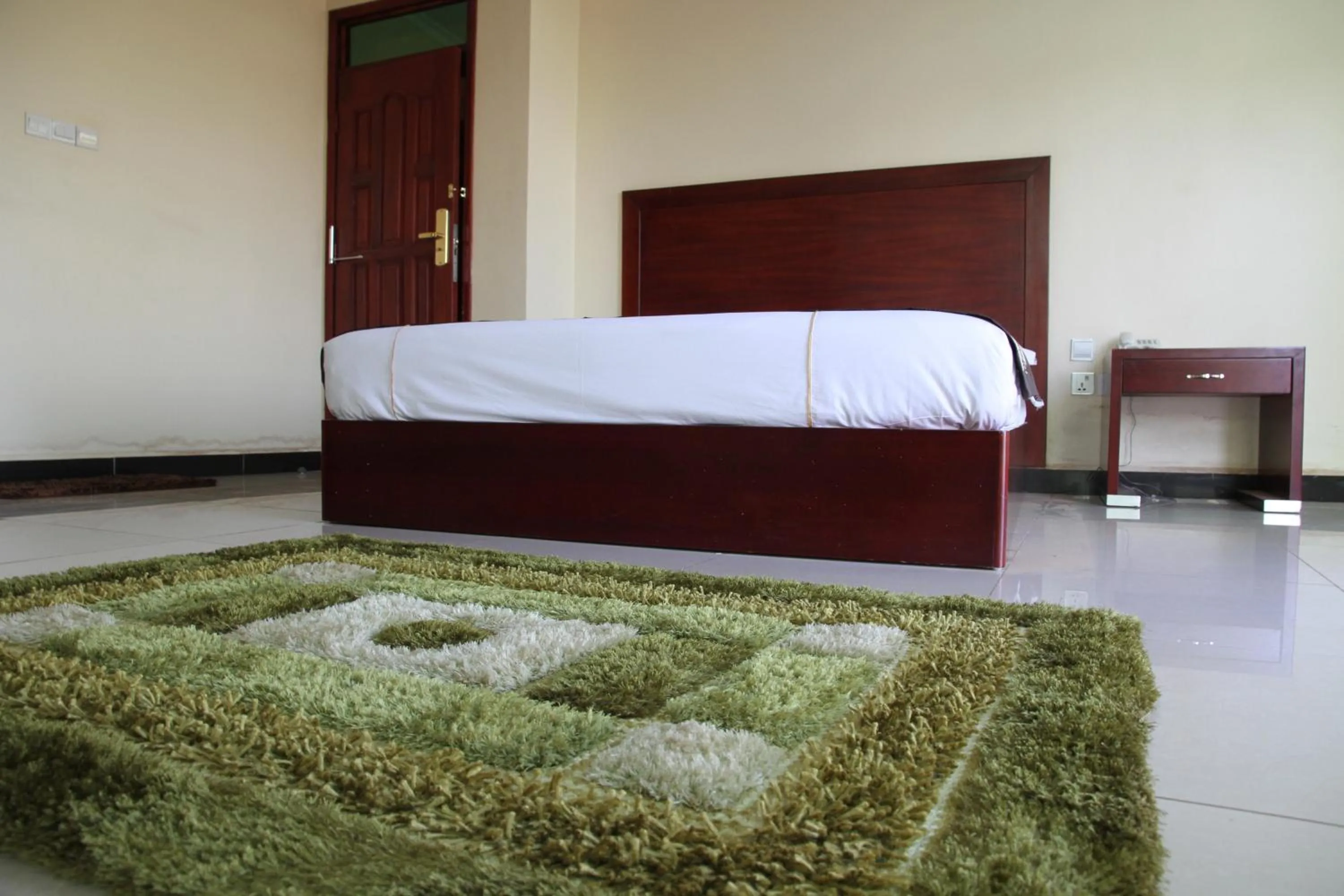 Bed in Namayiba Park Hotel Kampala