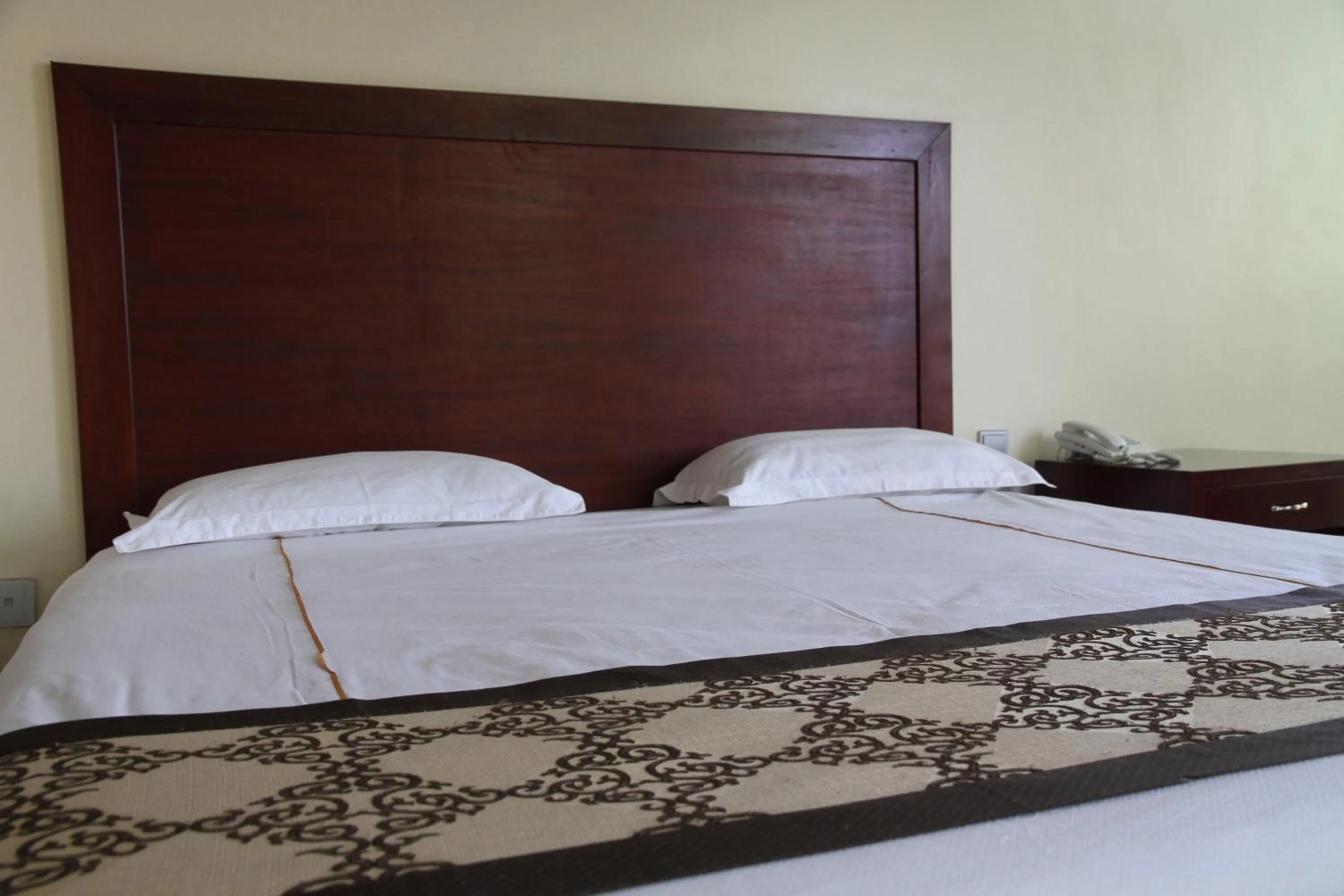 Bed in Namayiba Park Hotel Kampala