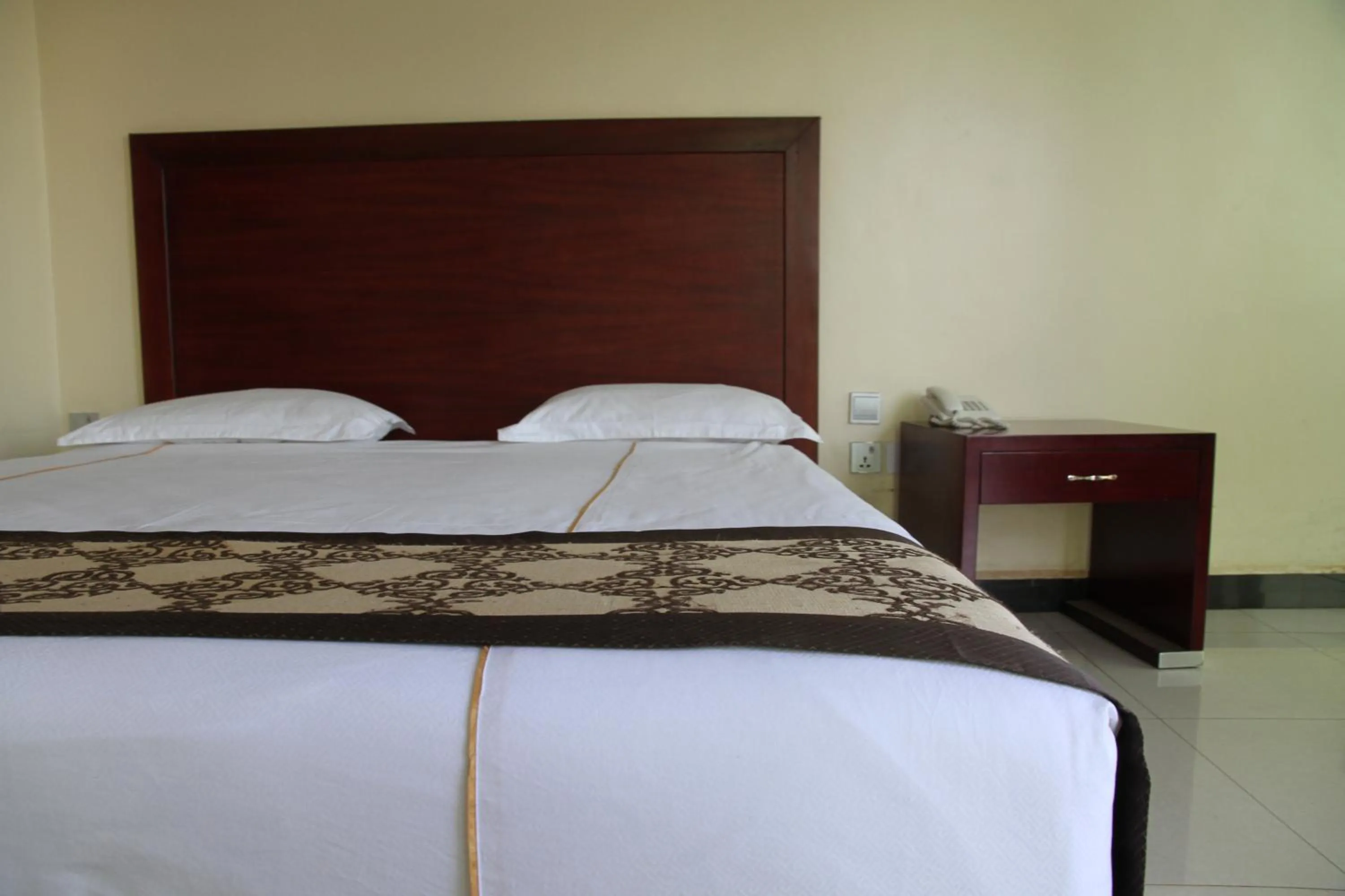 Bed in Namayiba Park Hotel Kampala