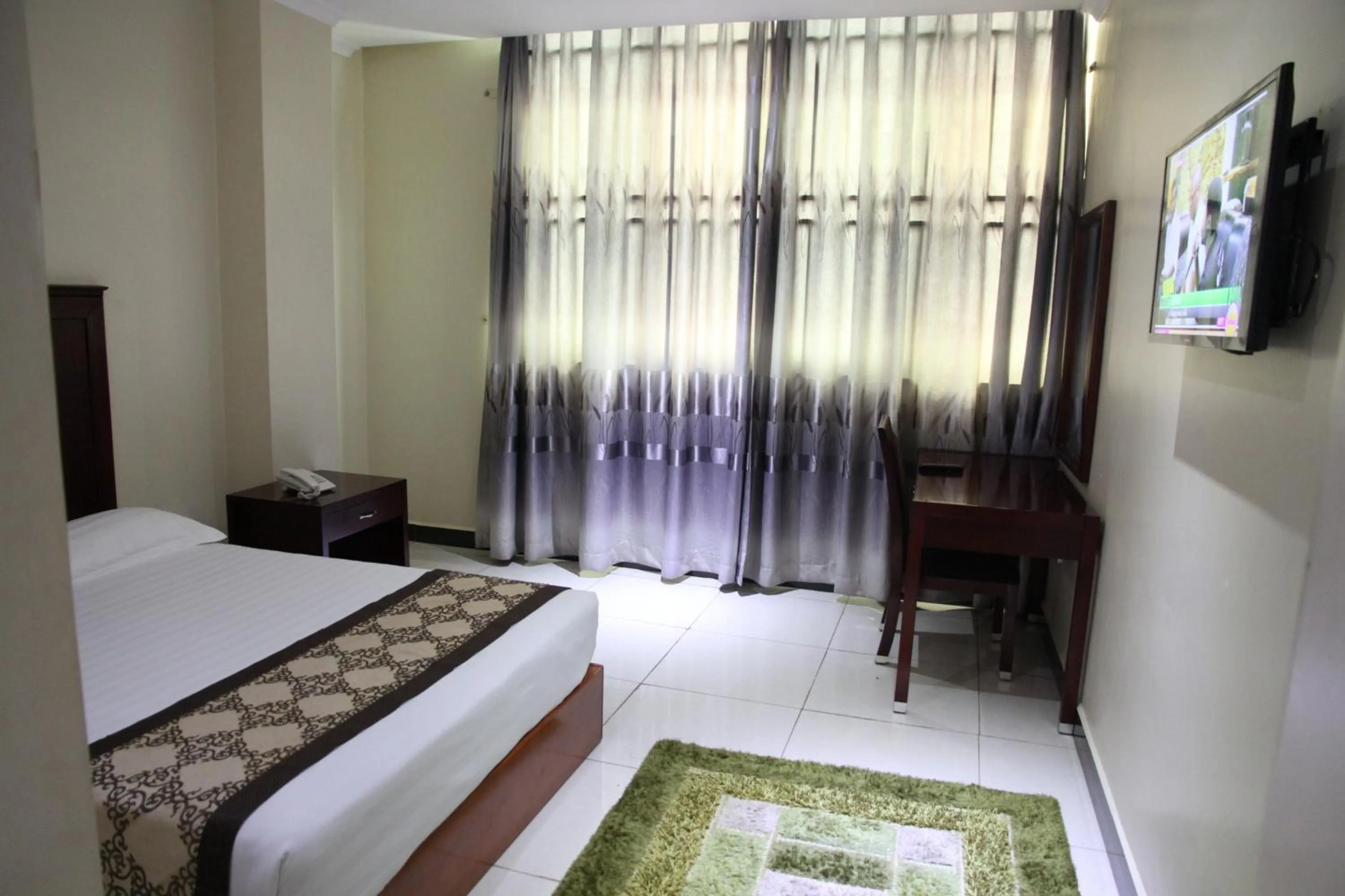 Bedroom in Namayiba Park Hotel Kampala