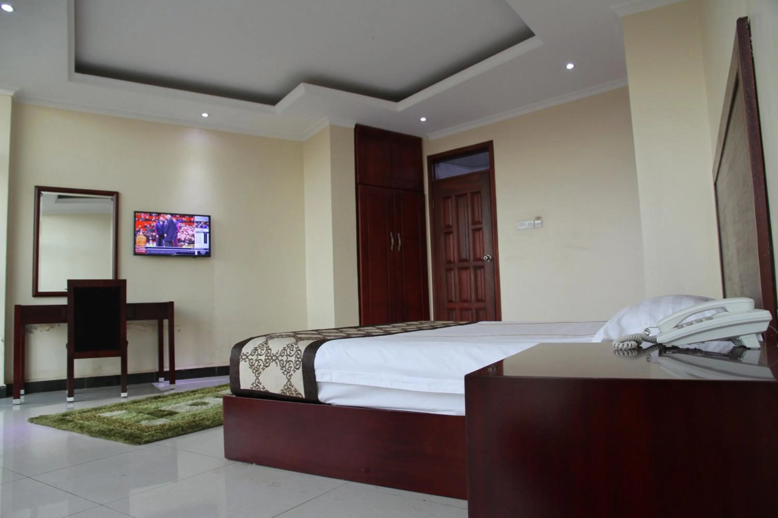 Bed in Namayiba Park Hotel Kampala