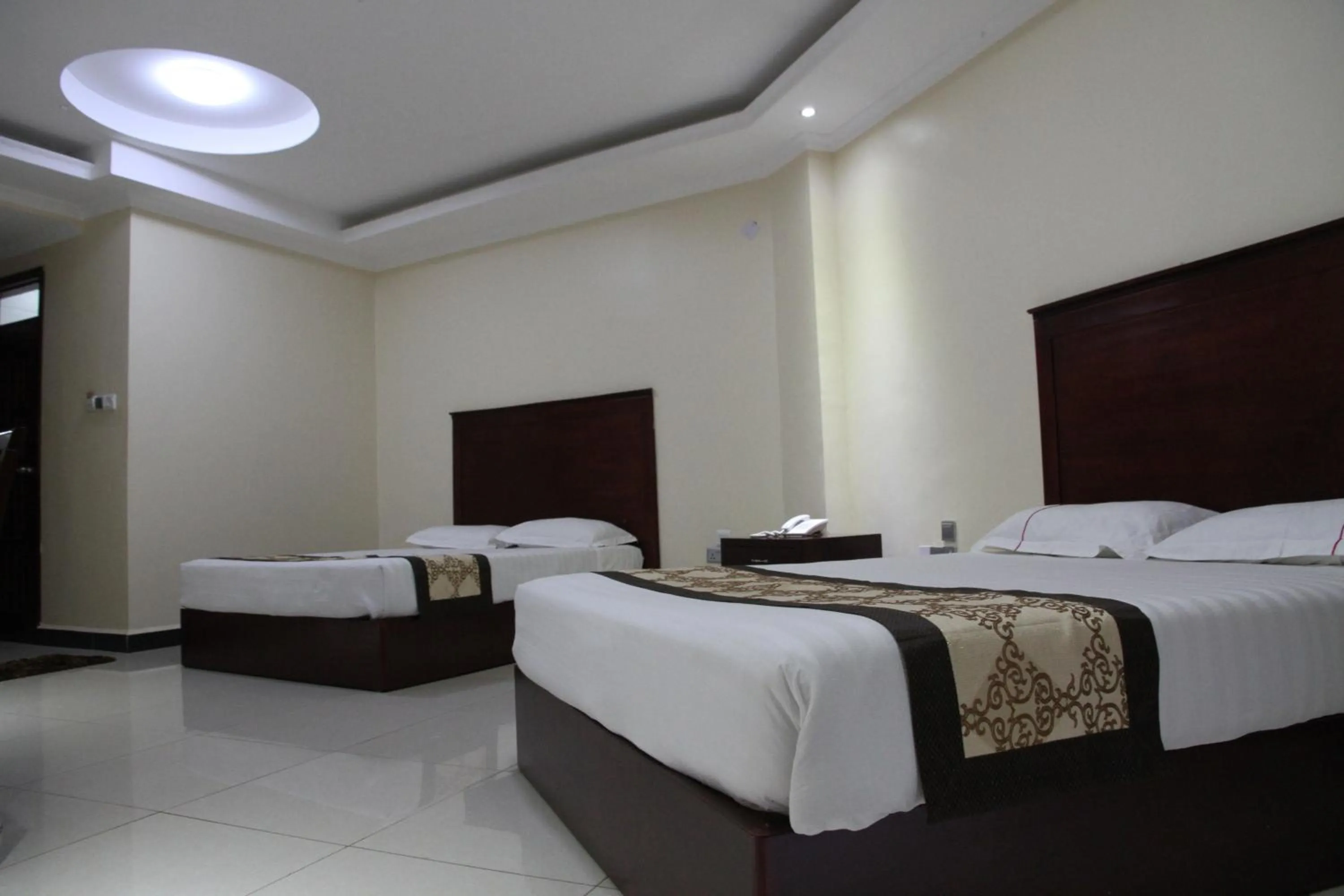 Bed in Namayiba Park Hotel Kampala