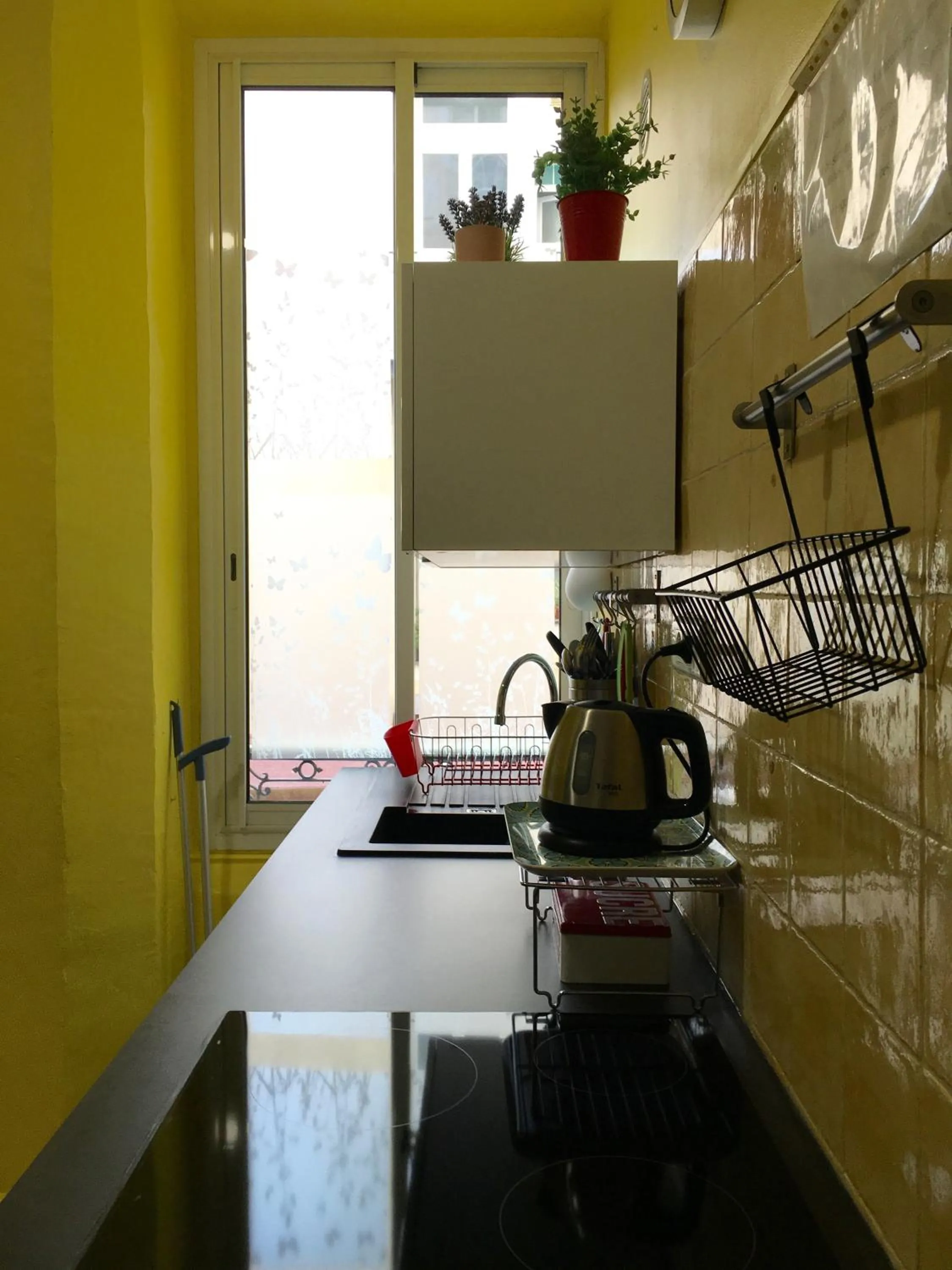 Kitchen or kitchenette in Backpackers Chez Patrick