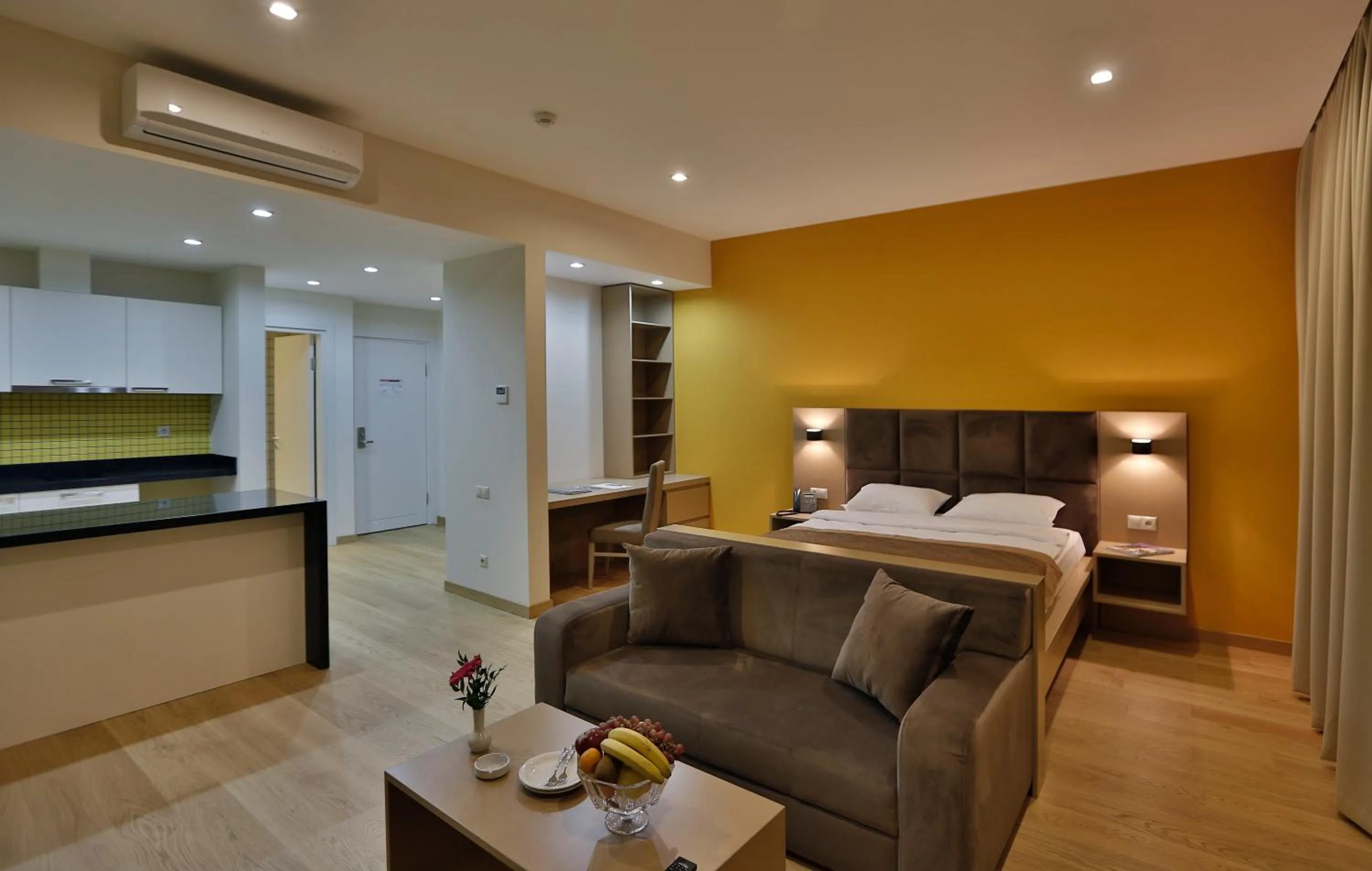 Kitchen or kitchenette, Bed in HomeBridge Hotel Apartments