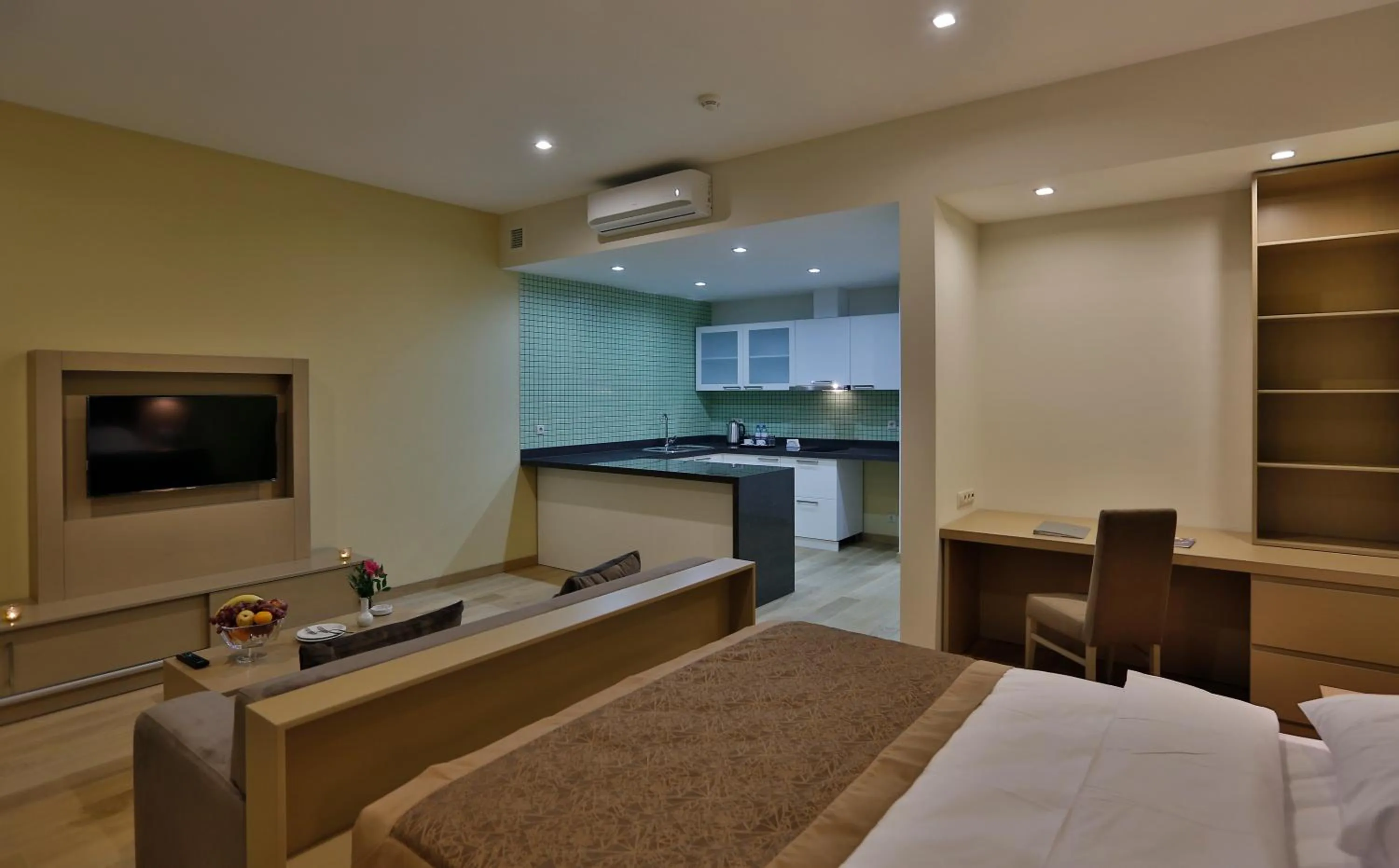 Kitchen or kitchenette, Bed in HomeBridge Hotel Apartments