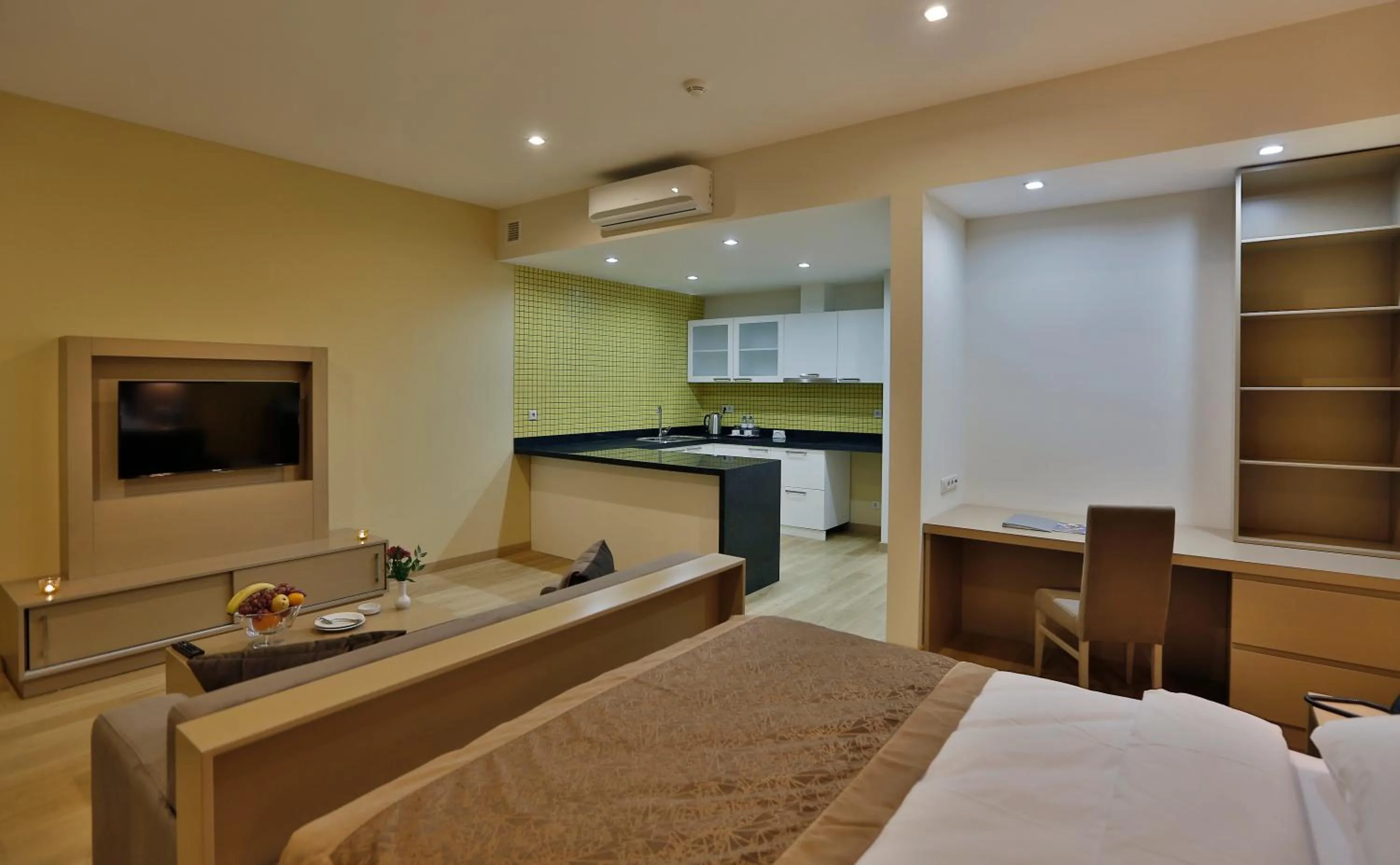 Kitchen or kitchenette, Bed in HomeBridge Hotel Apartments