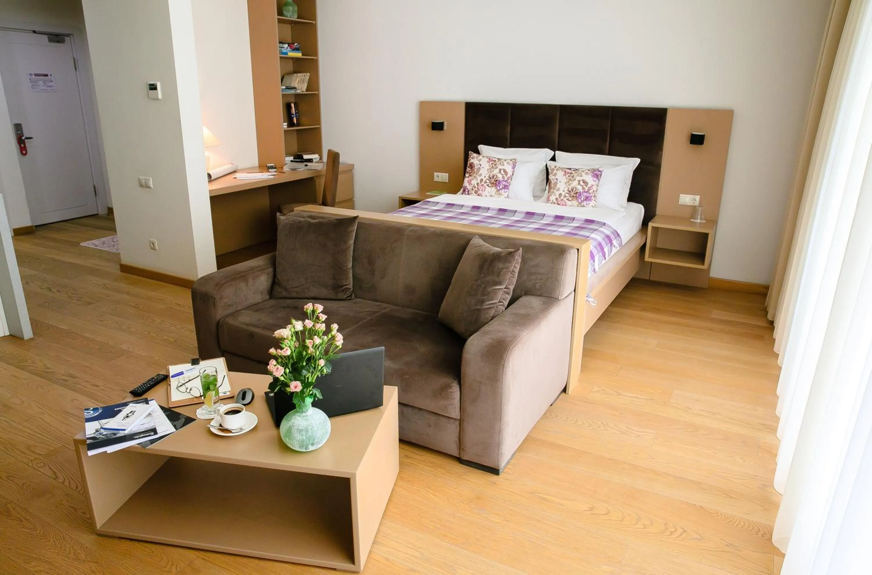 Bed in HomeBridge Hotel Apartments