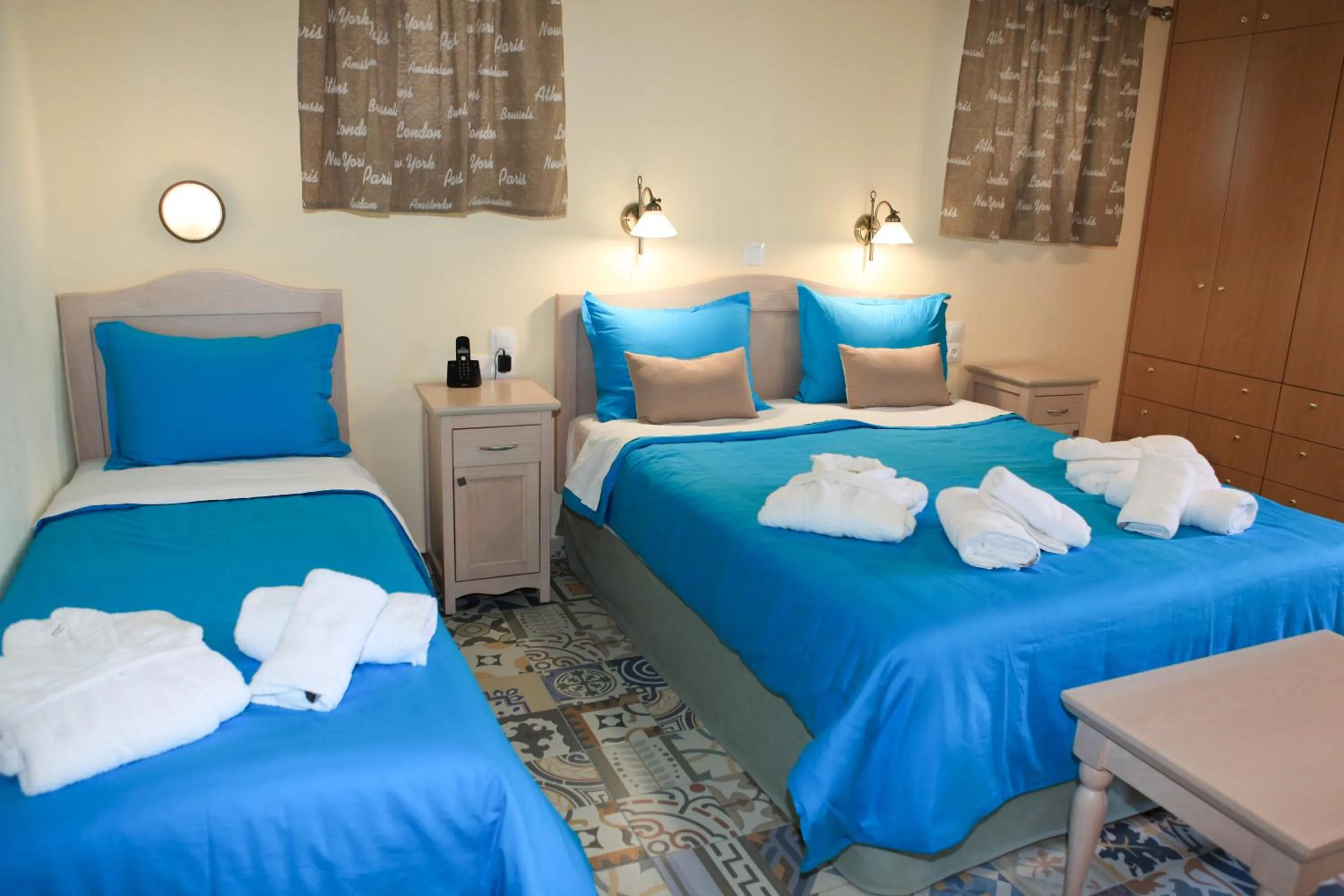 Bed in Stafylos Suites & Boutique hotel