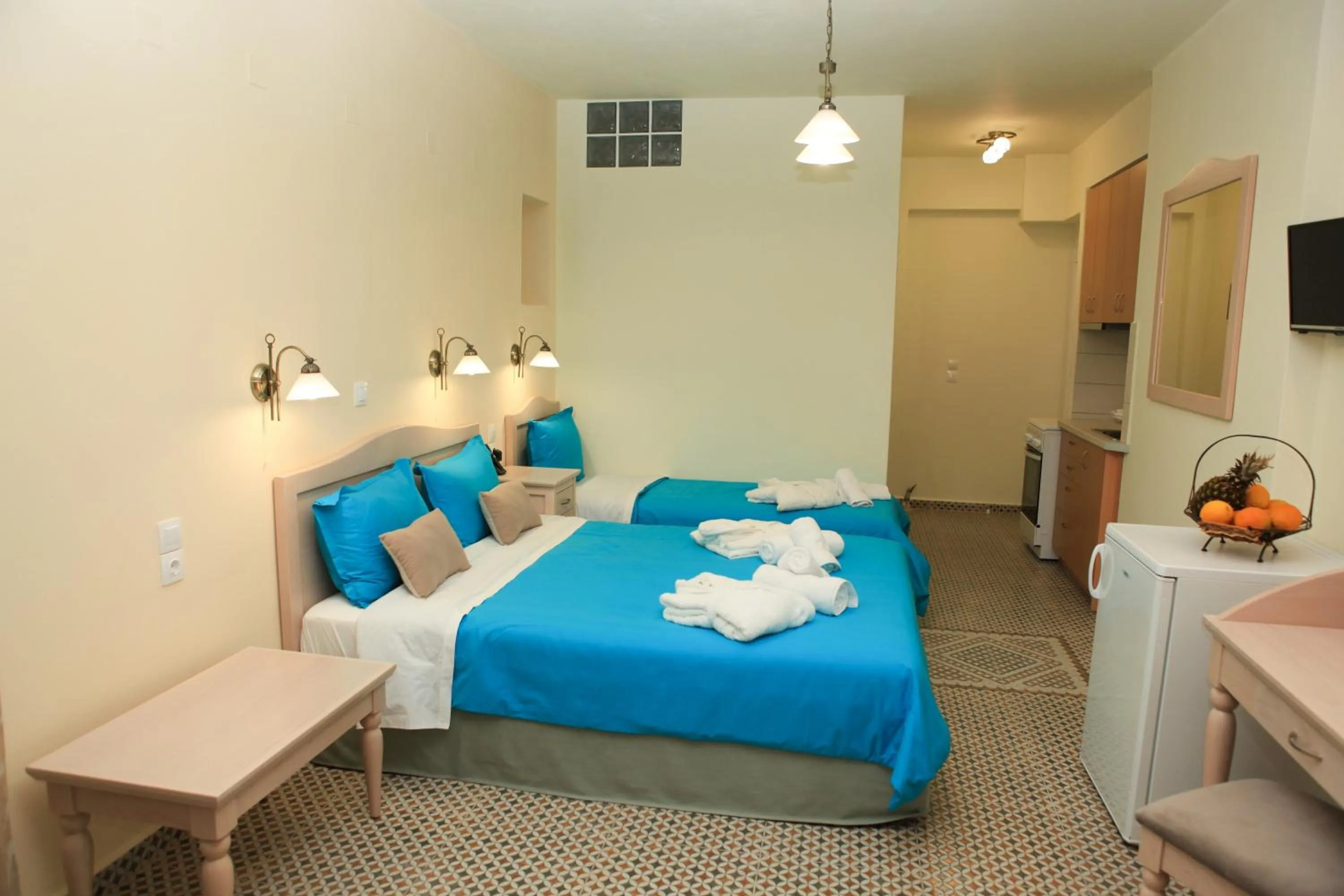 Bed in Stafylos Suites & Boutique hotel