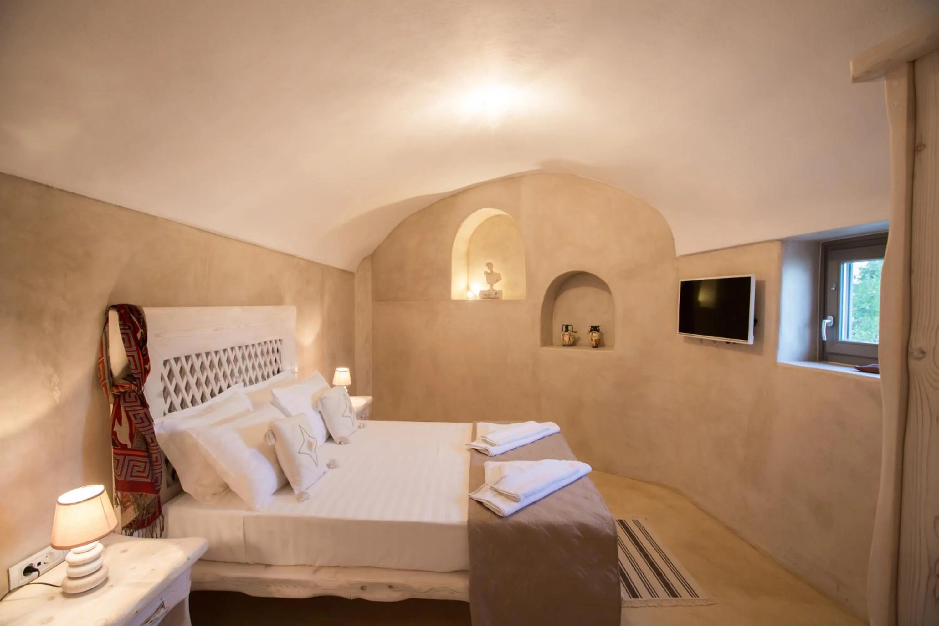 Bedroom in Love Nest with hot tub, hammam & outdoor cinema