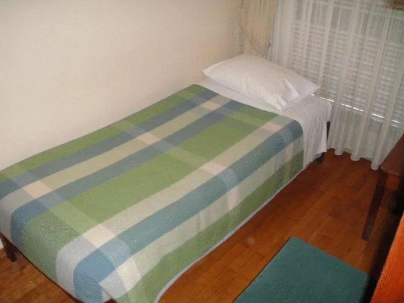 Bed in Hotel Alexandros