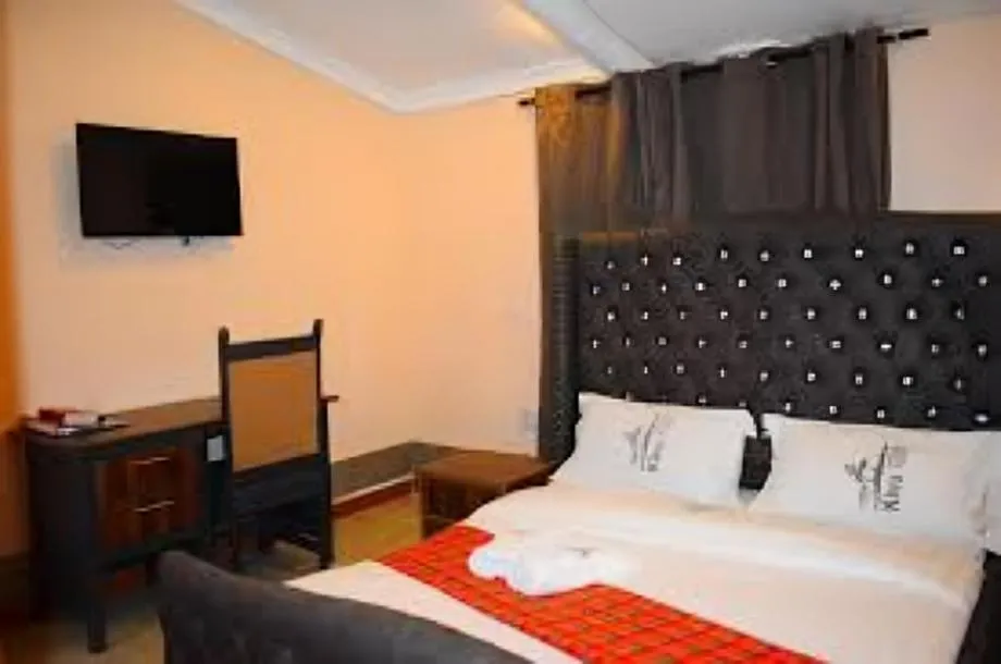 Bed in Kivu Resort