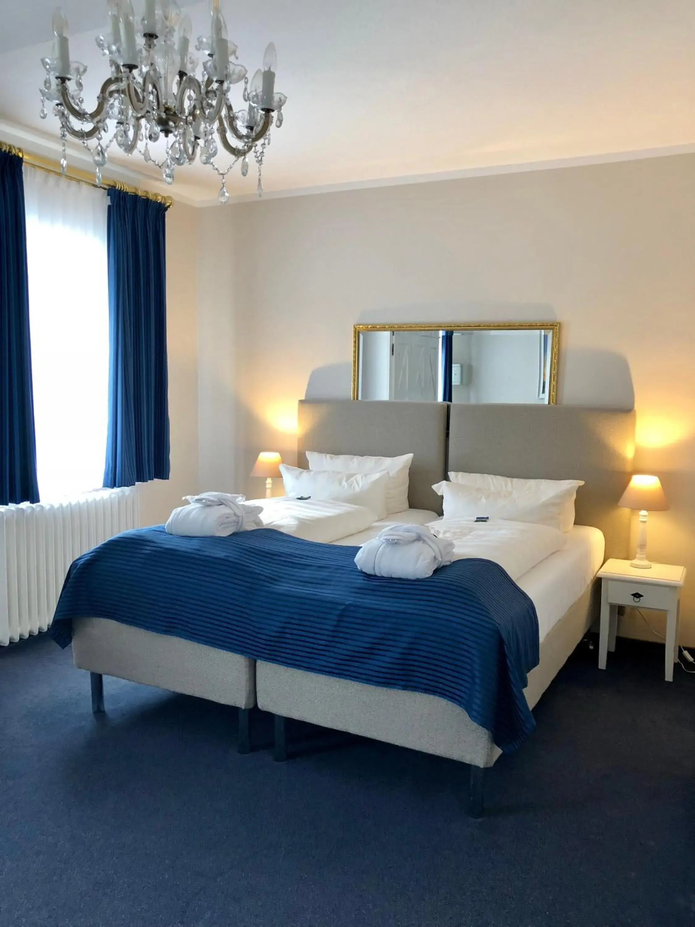 Photo of the whole room, Bed in Hotel Sylter Blaumuschel Photo of the whole room, Bed in Hotel Sylter Blaumuschel