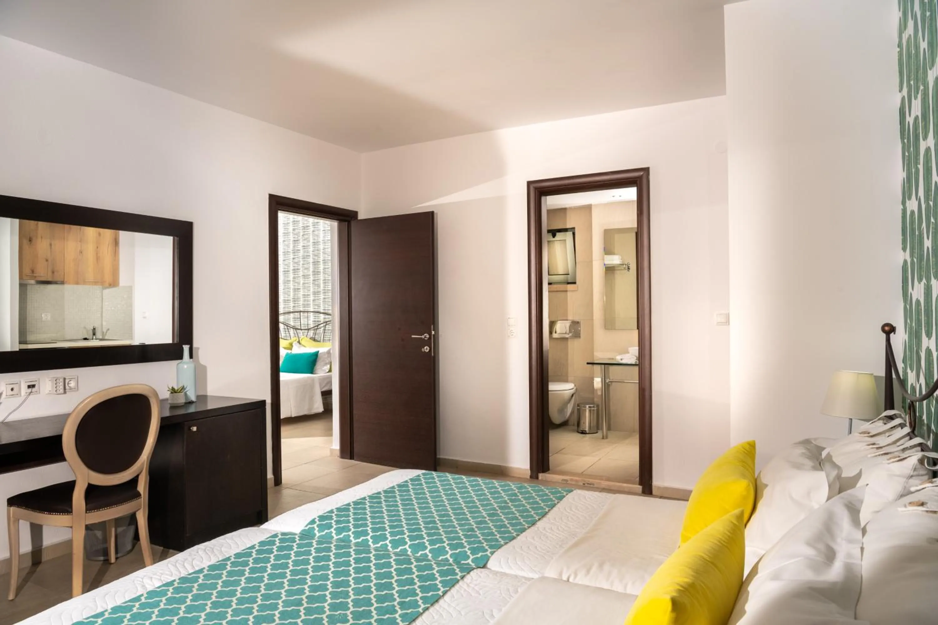 Bed in Angela Studios Apartments