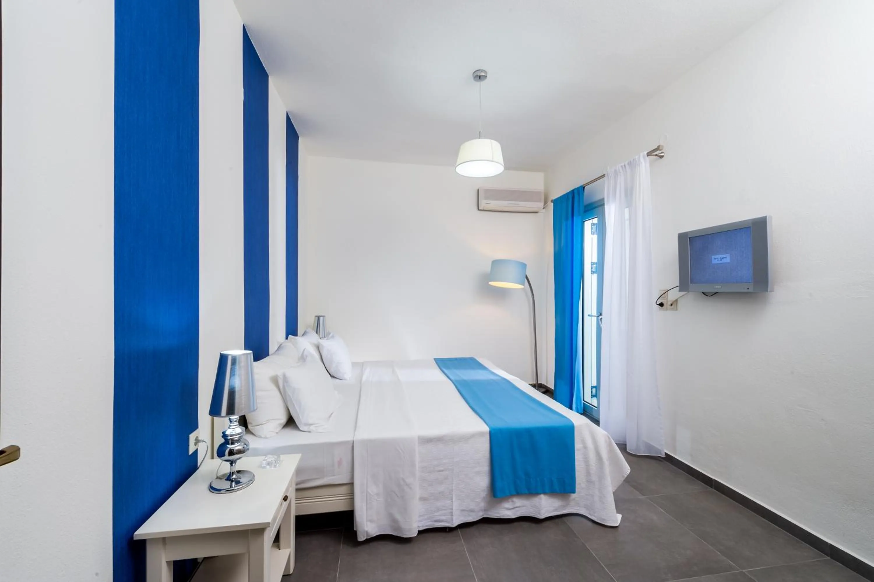 Bedroom, Bed in Angela Studios Apartments