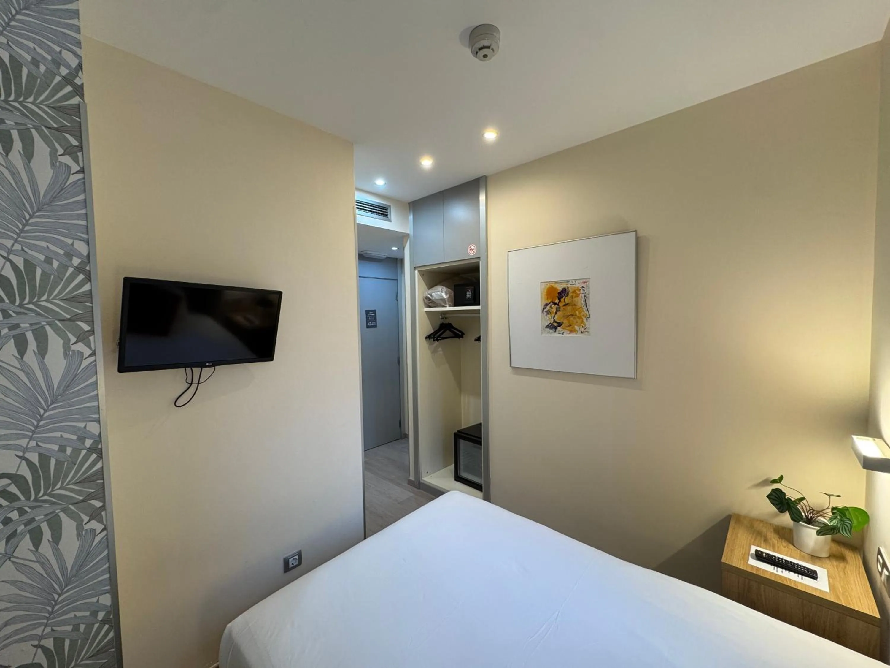 Bed in Welcome Gros Hotel