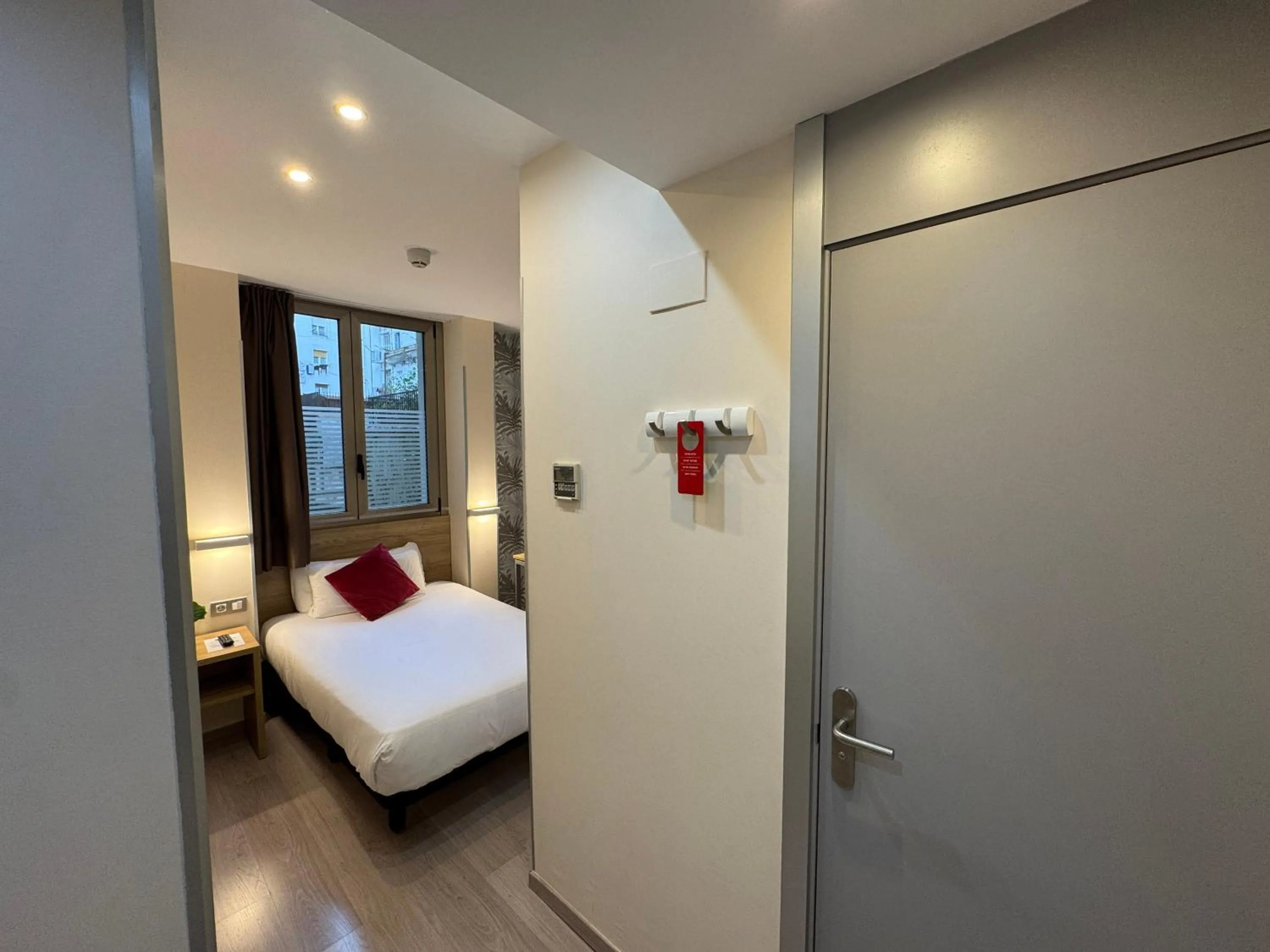 Bed in Welcome Gros Hotel