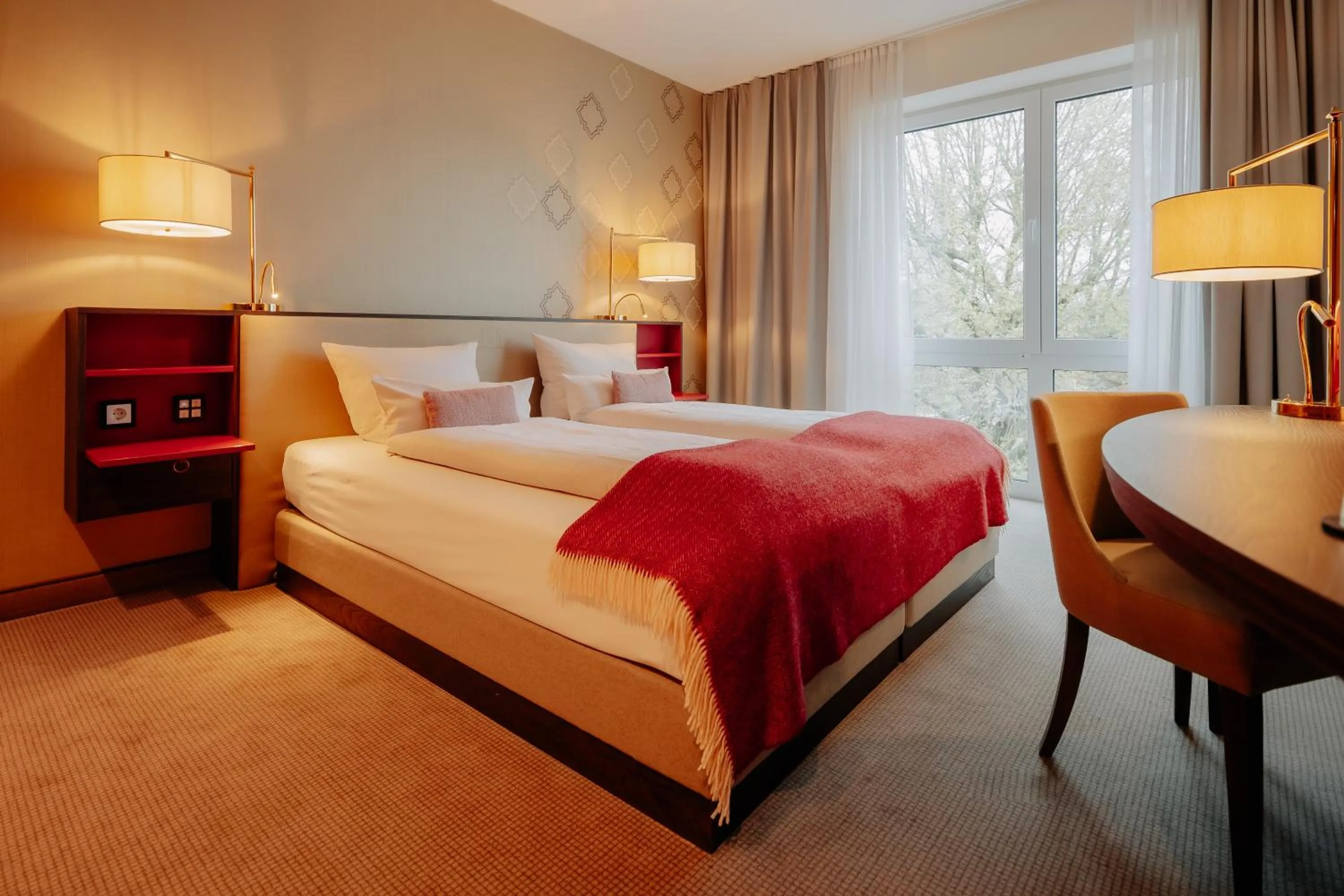 Photo of the whole room, Bed in LOOKEN INN Lingen by Hackmann