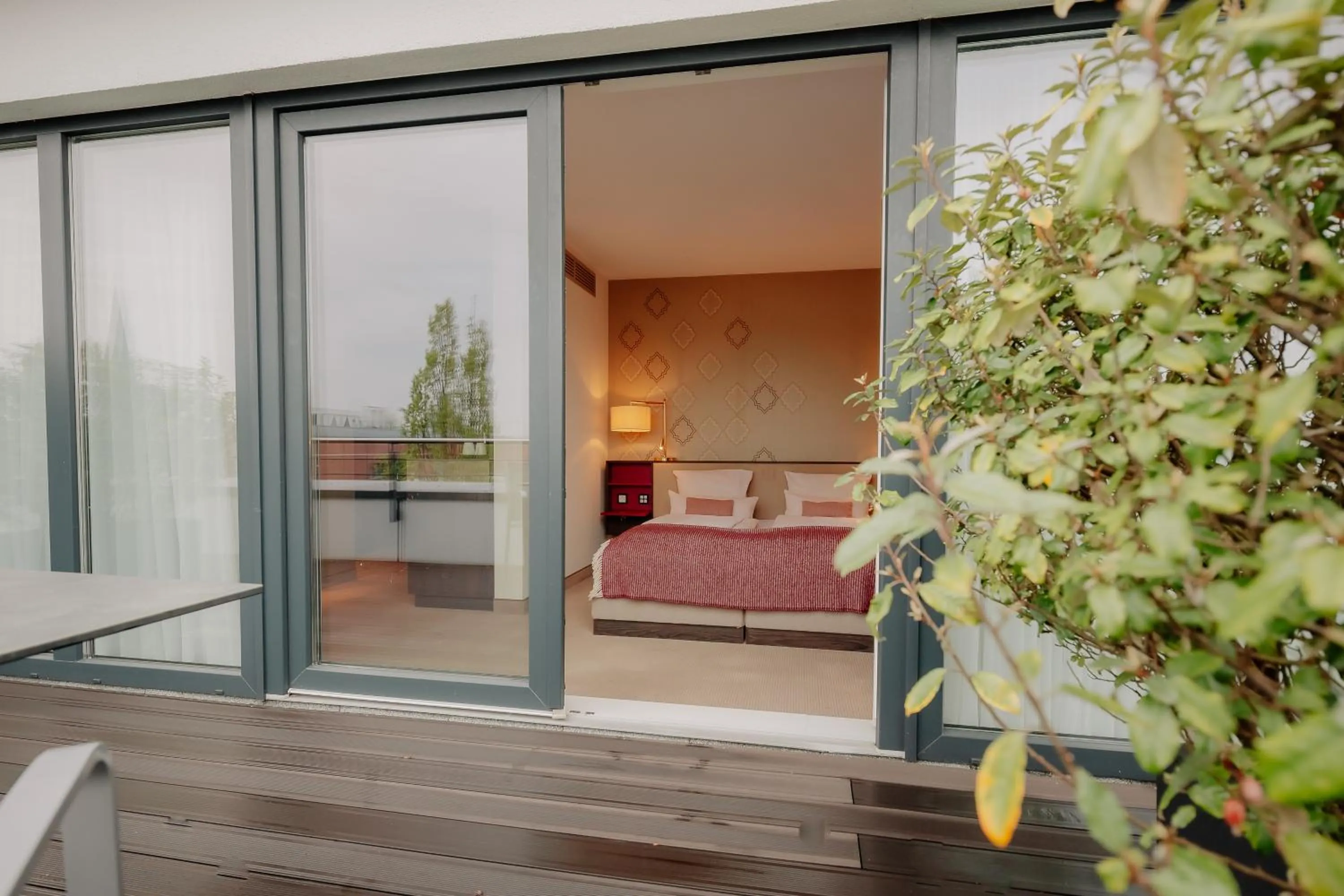 Photo of the whole room, Bed in LOOKEN INN Lingen by Hackmann