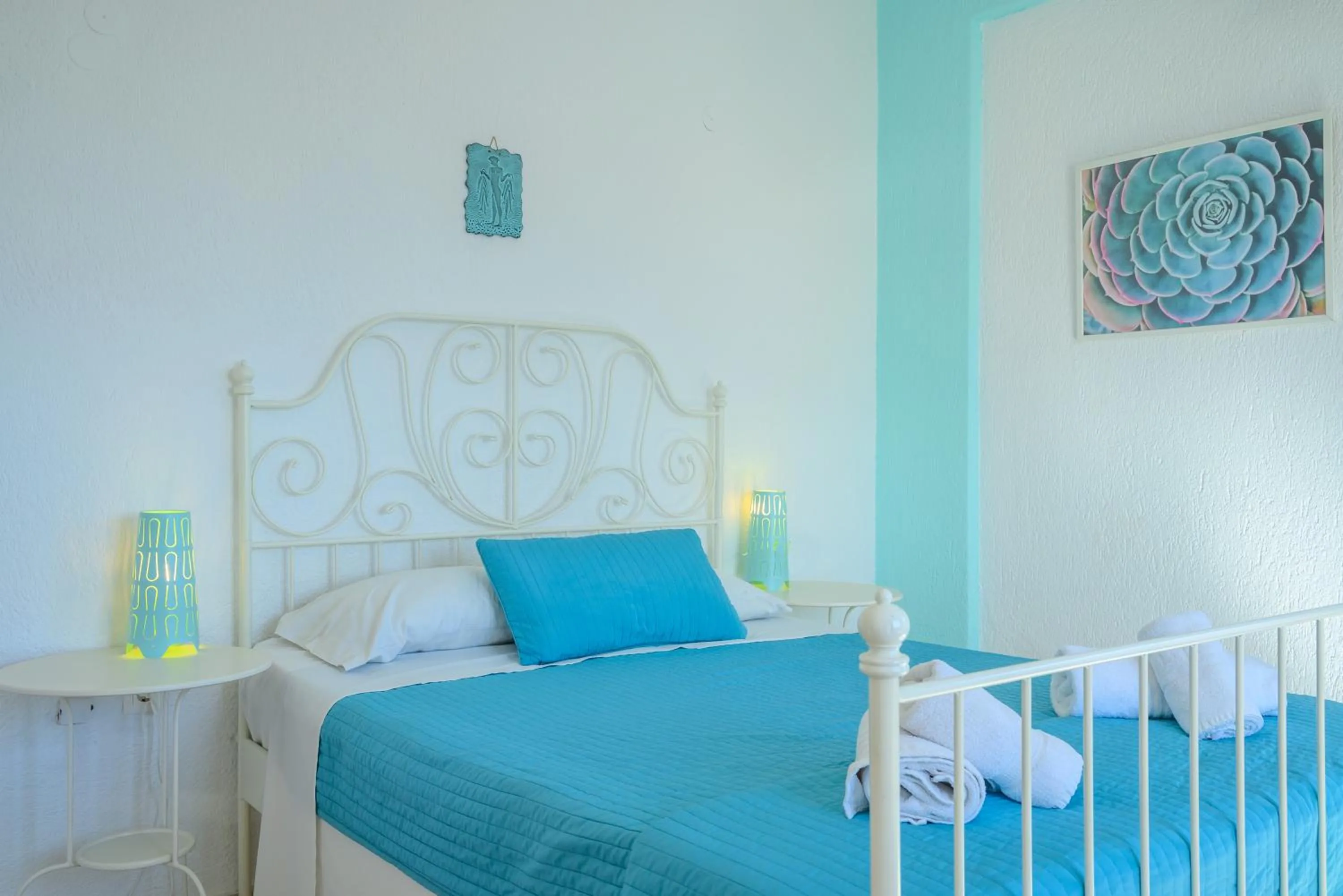 Bed in Havania Apartments