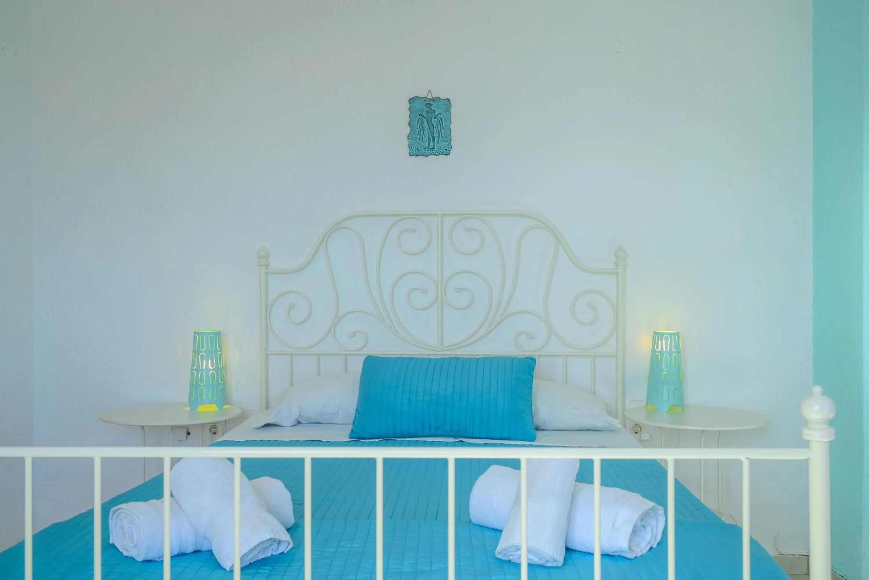 Bed in Havania Apartments