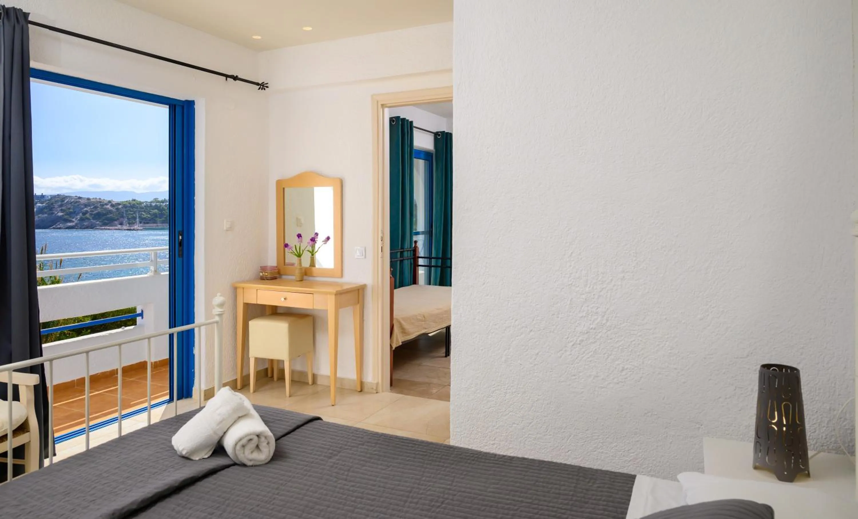 Bed in Havania Apartments