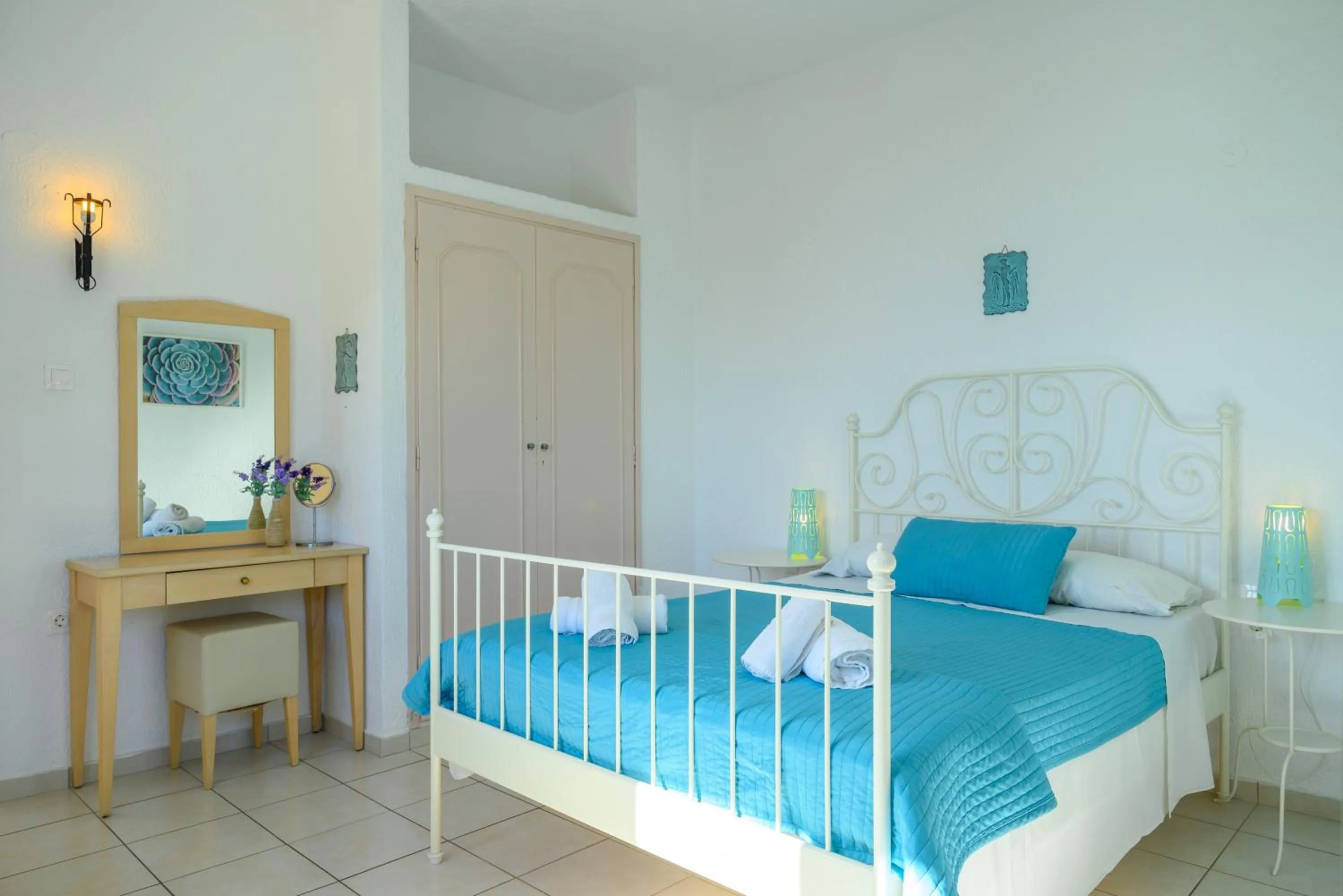 Bed in Havania Apartments
