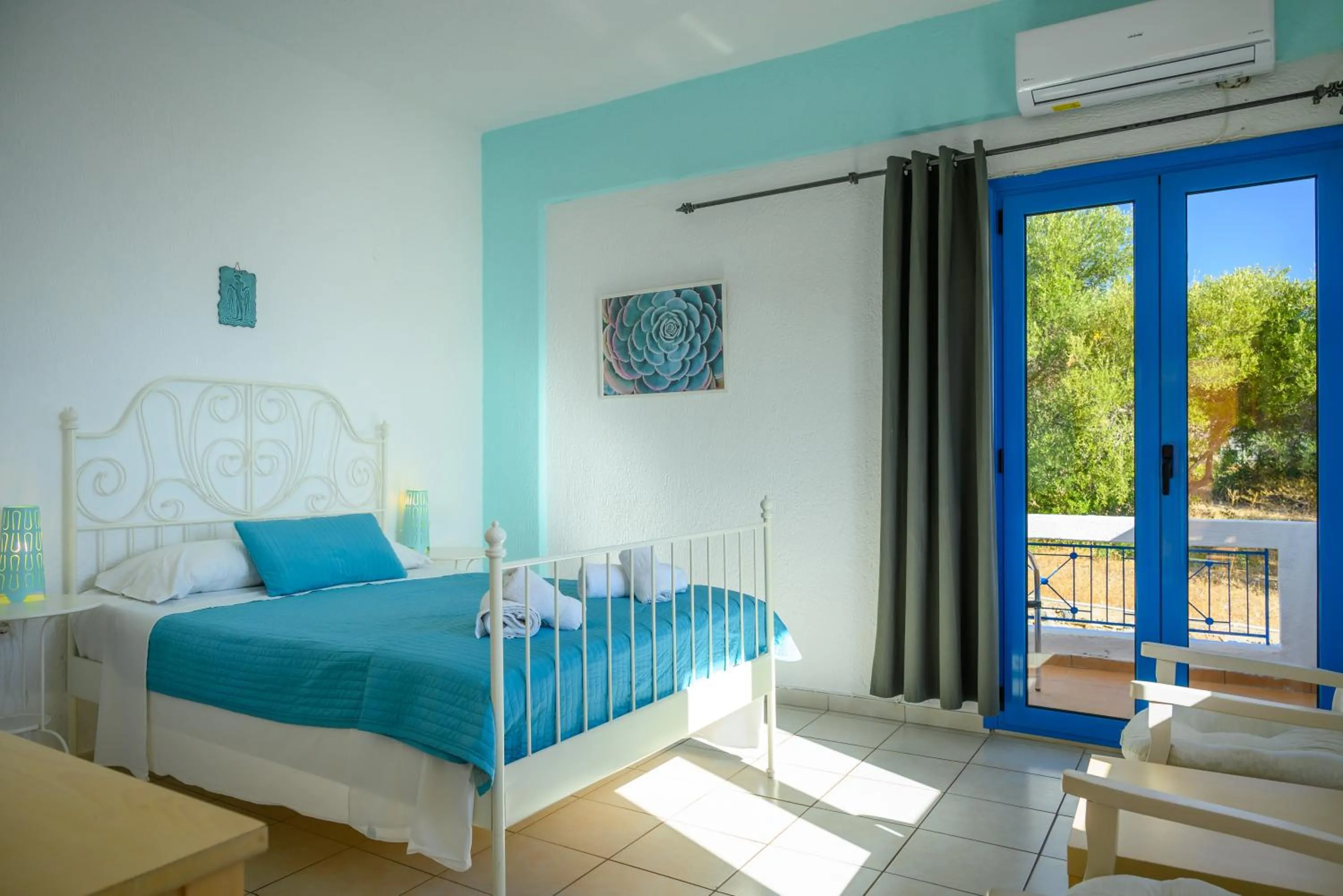 Bed in Havania Apartments
