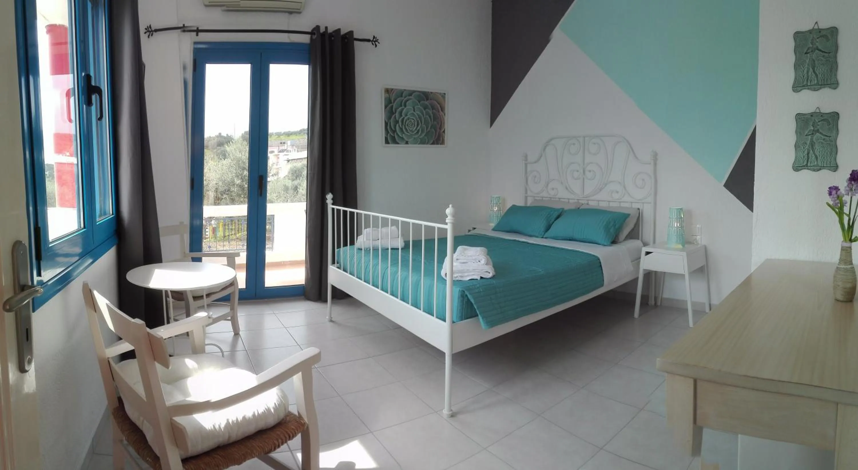 Bed in Havania Apartments