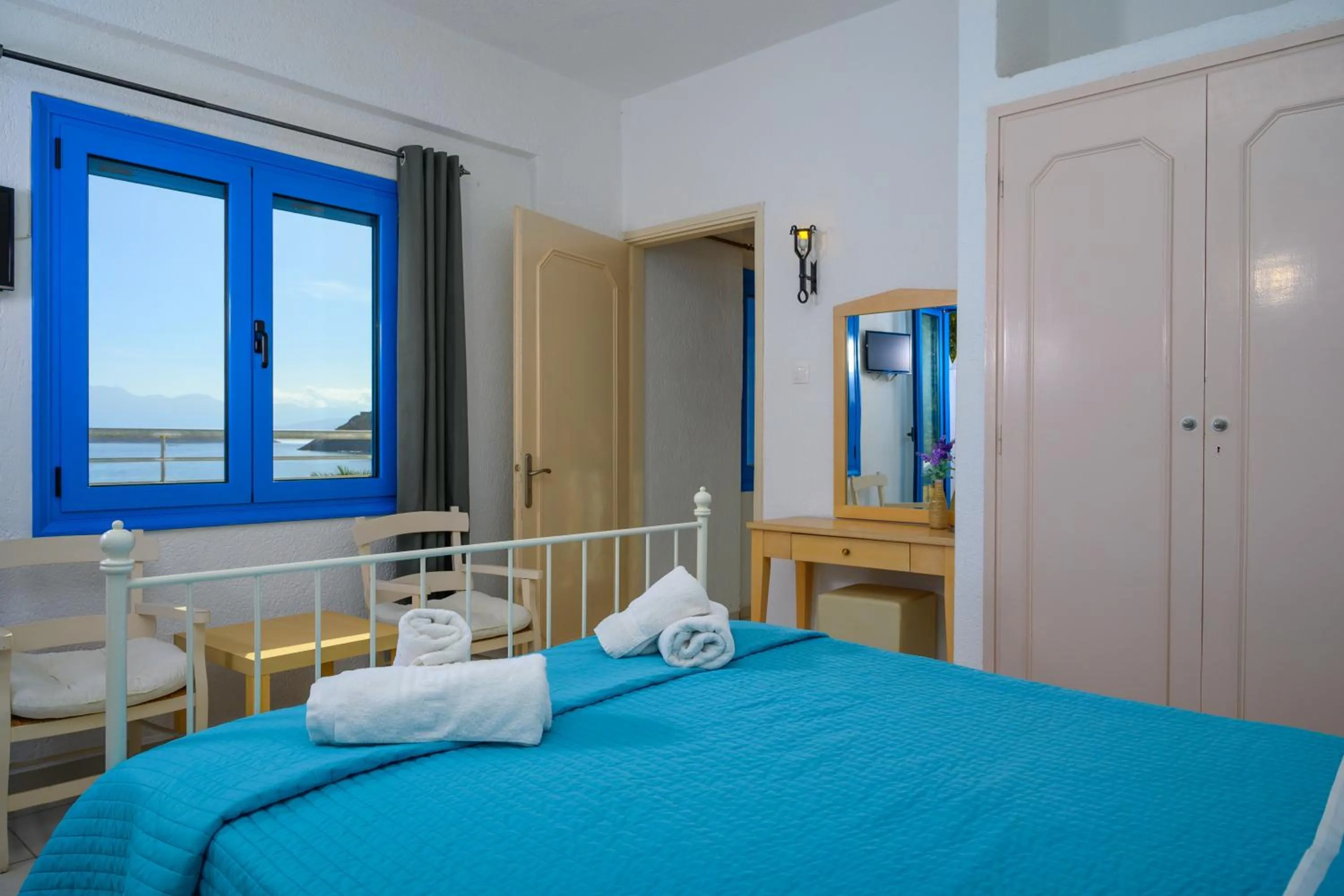 Bed in Havania Apartments