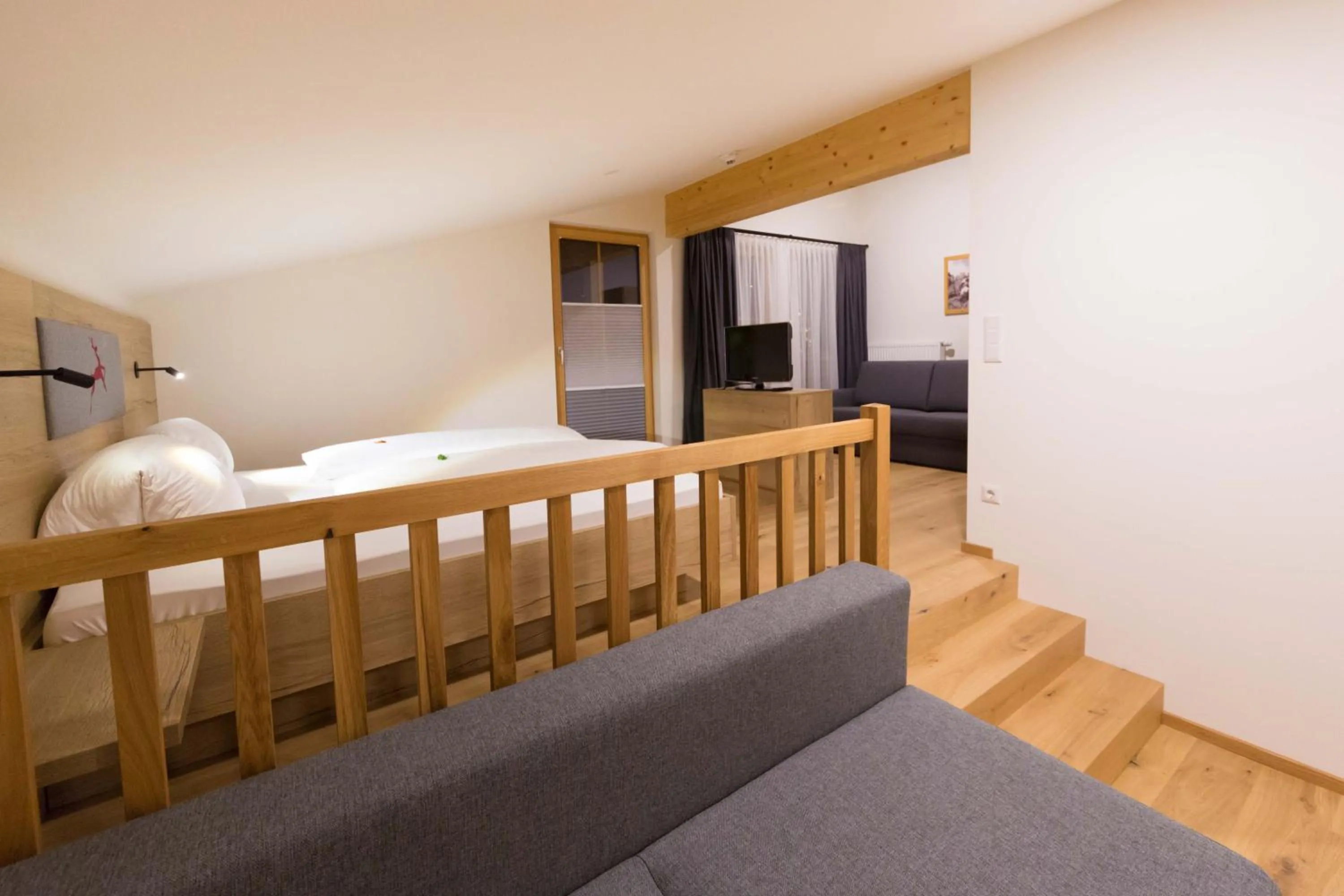 Living room, Bed in Hotel Rosner