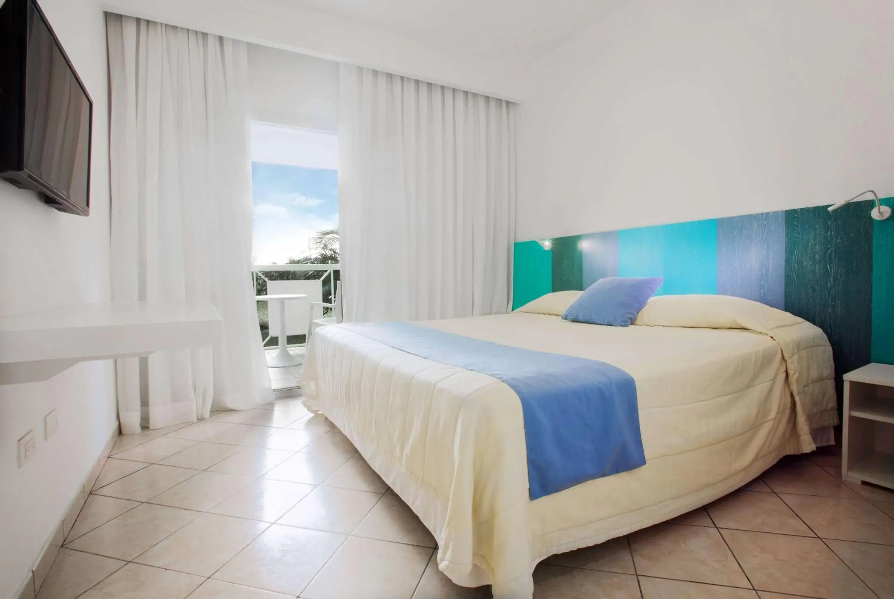 Photo of the whole room, Bed in Viva Tangerine by Wyndham, A Trademark All Inclusive Photo of the whole room, Bed in Viva Tangerine by Wyndham, A Trademark All Inclusive