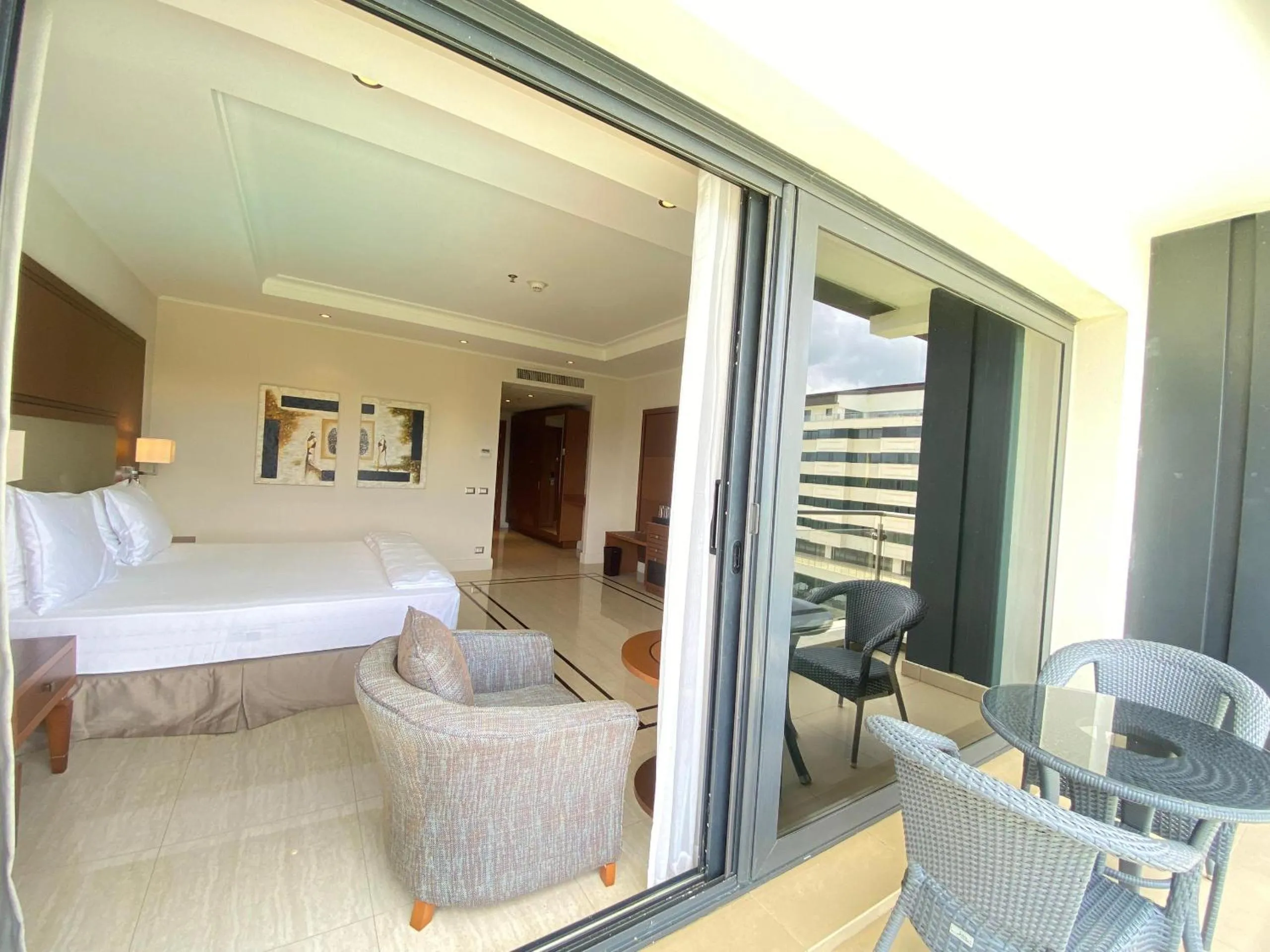 Seating area, Bed in Grand Hotel Djibloho