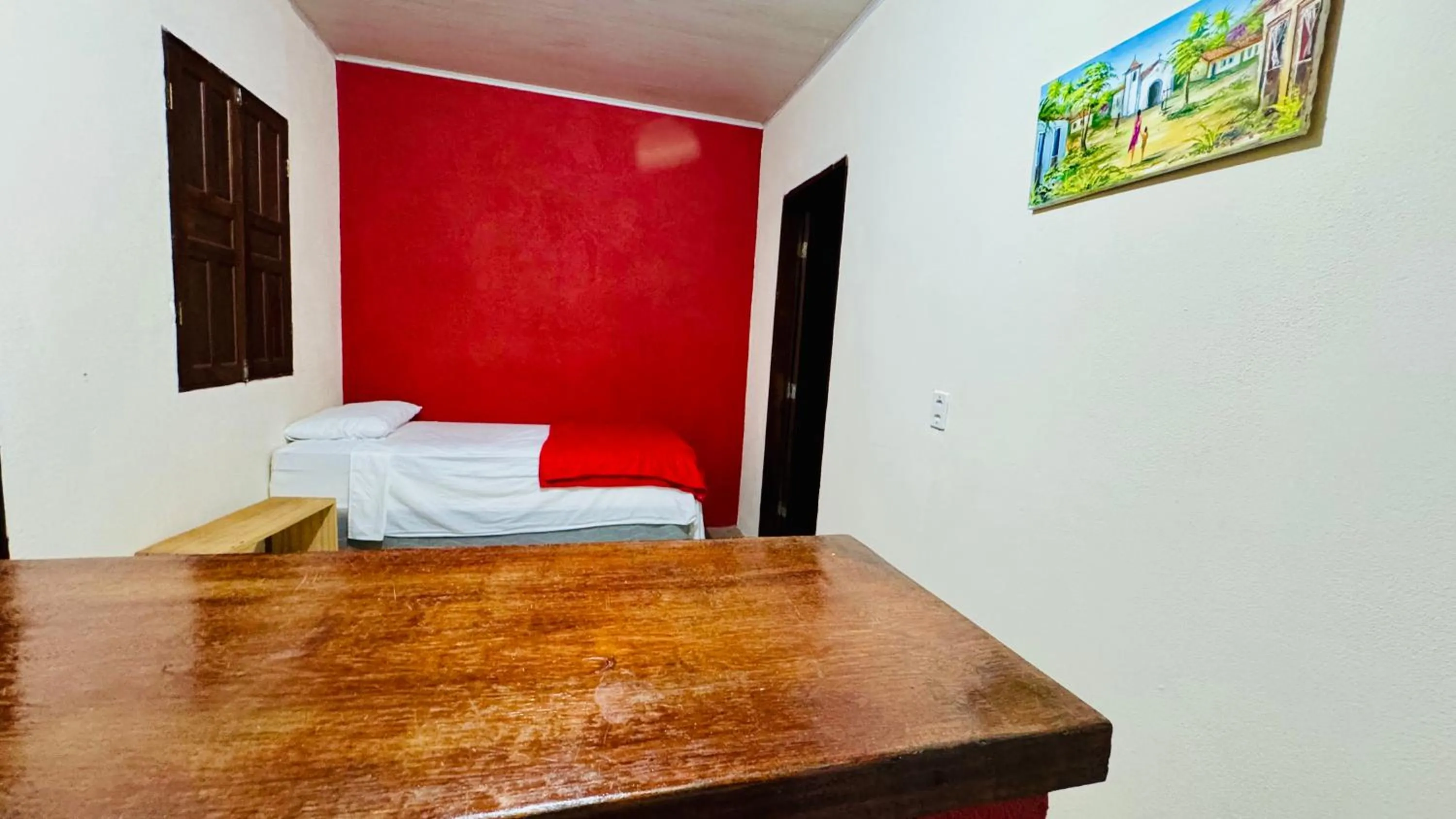 Bed in Pousada Aquarela