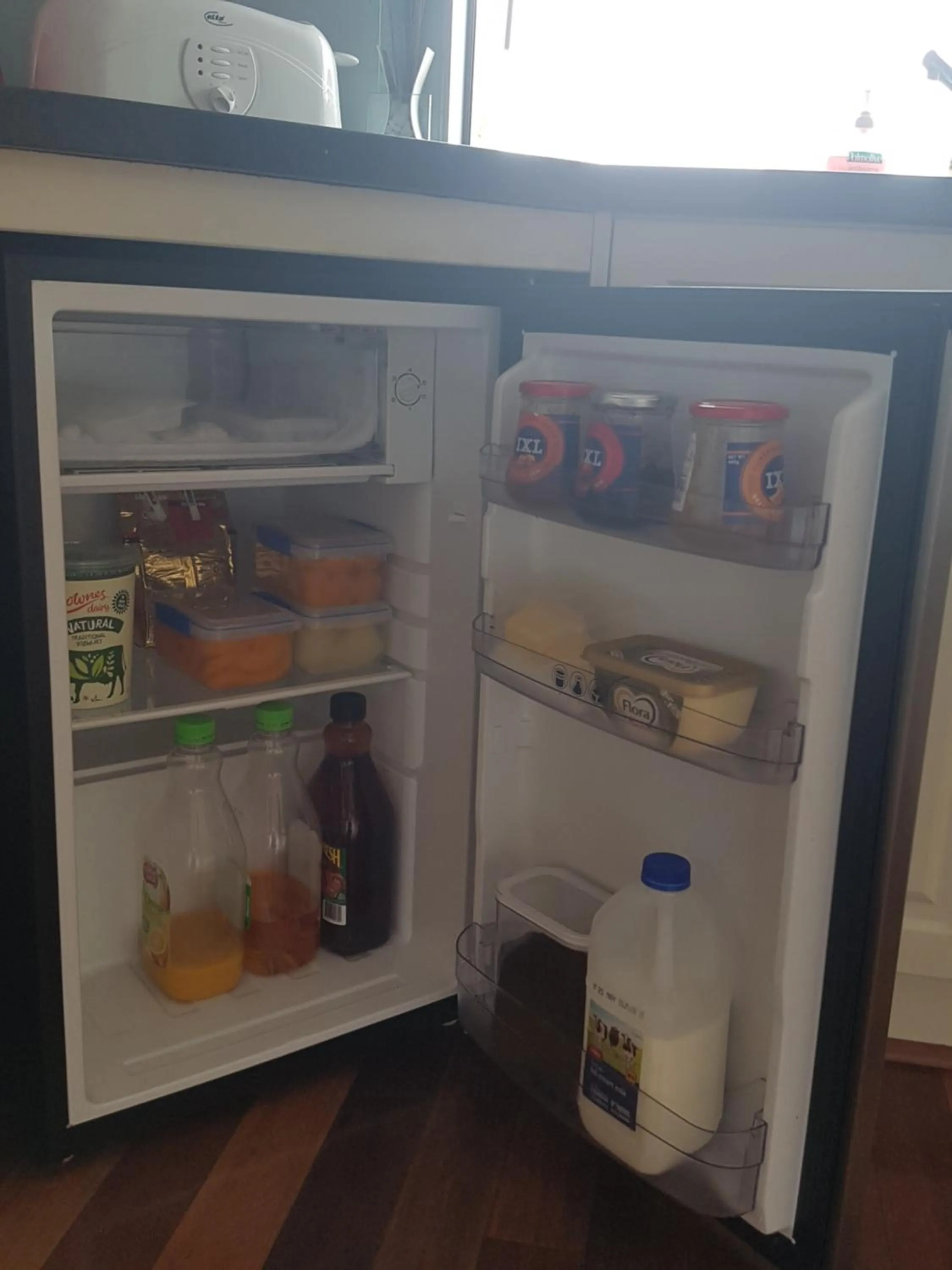 Kitchen or kitchenette in Ocean Reef Homestay