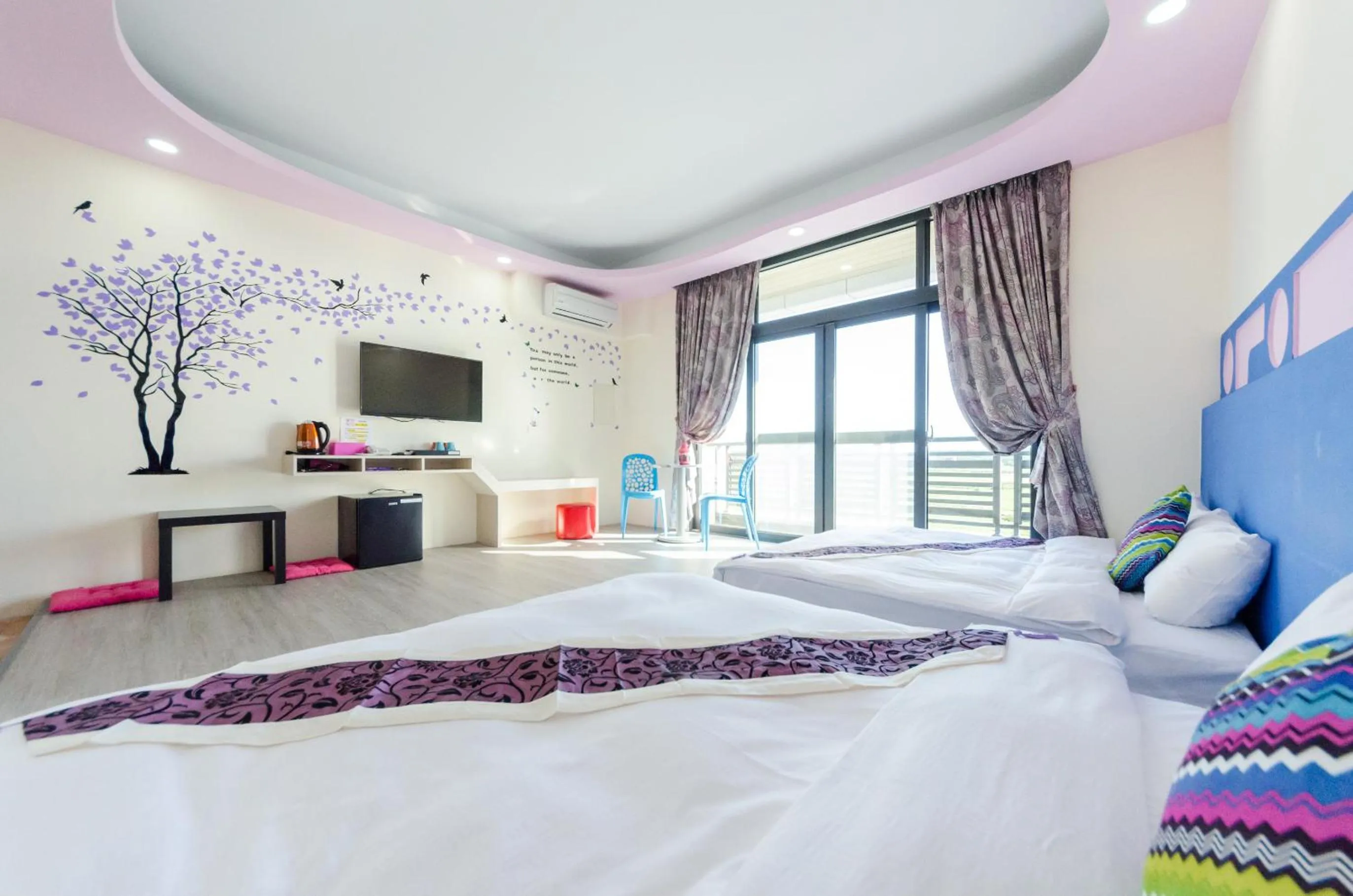 Bed in Kenting Aqual Inn