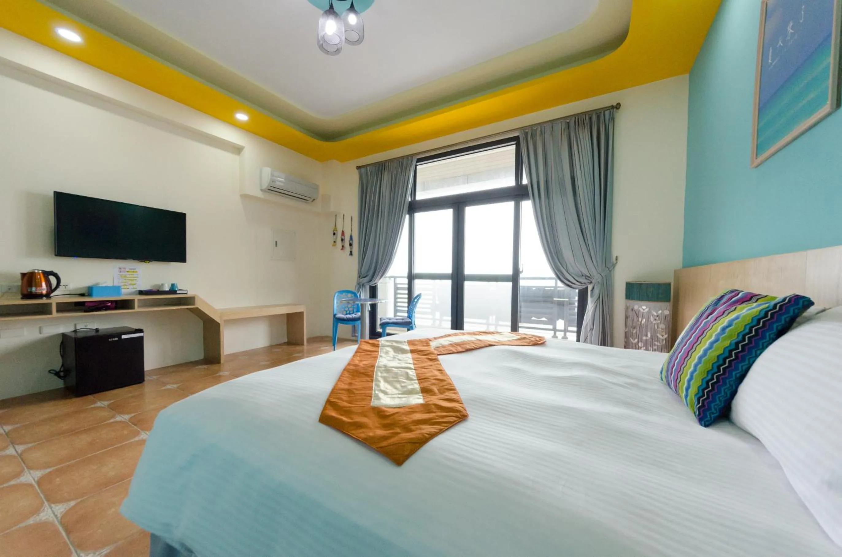 Bed in Kenting Aqual Inn