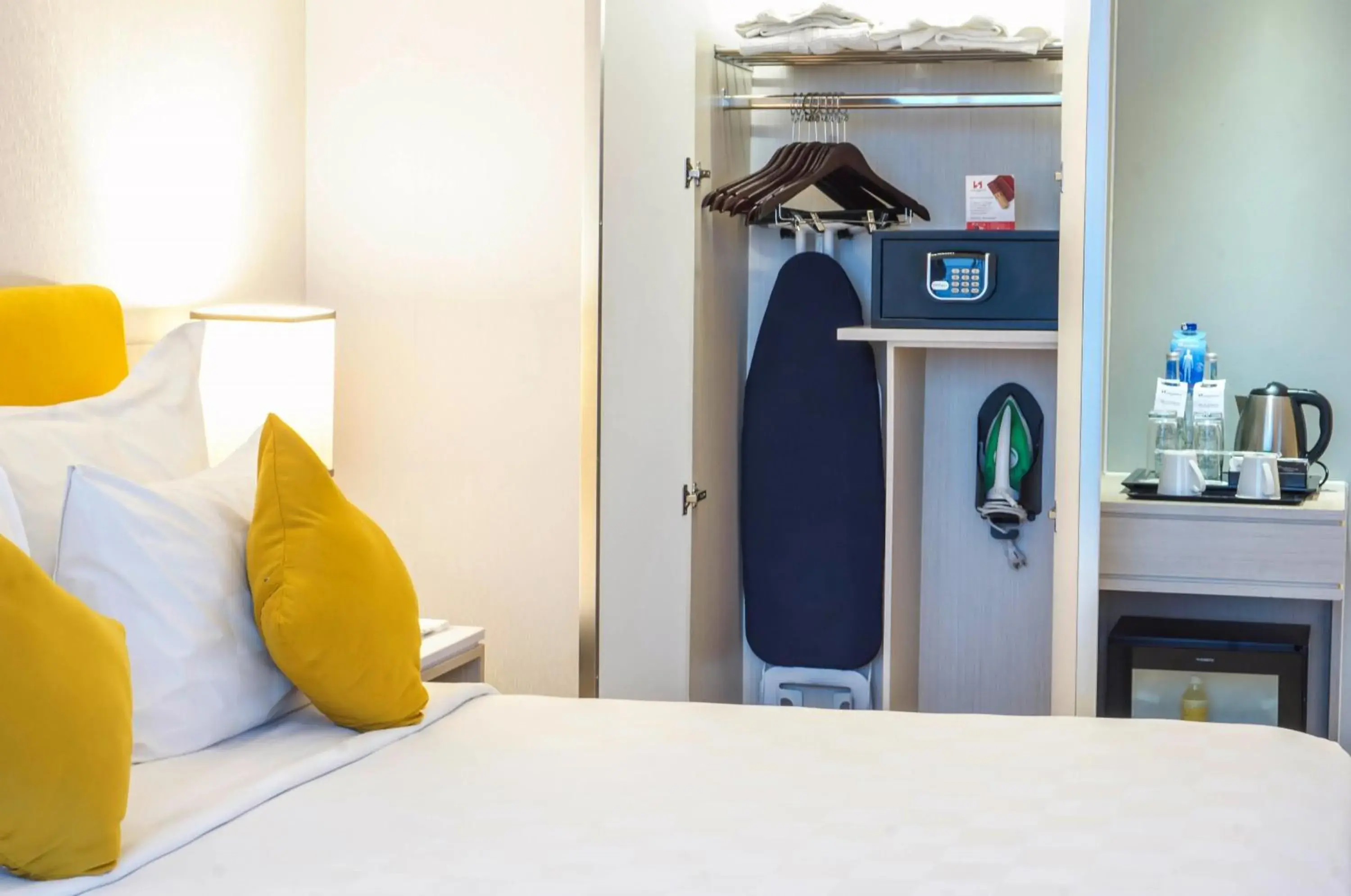 flat iron, Bed in Swiss-Belhotel Jambi flat iron, Bed in Swiss-Belhotel Jambi