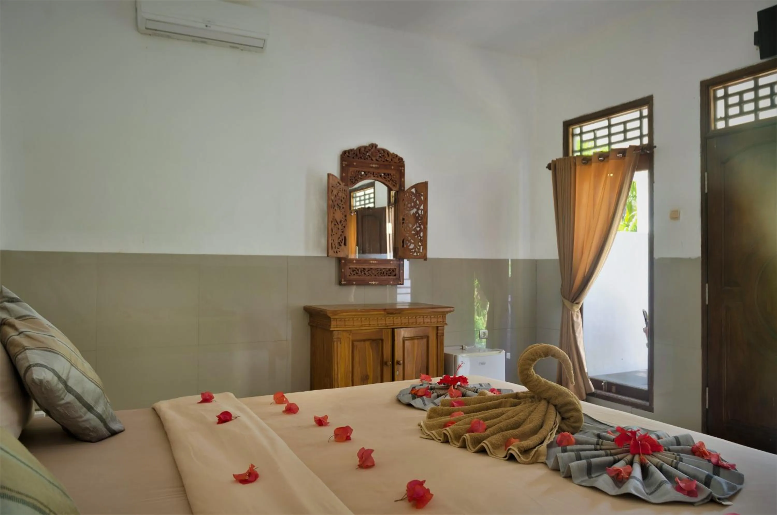 Bed in Warna Beach Hotel