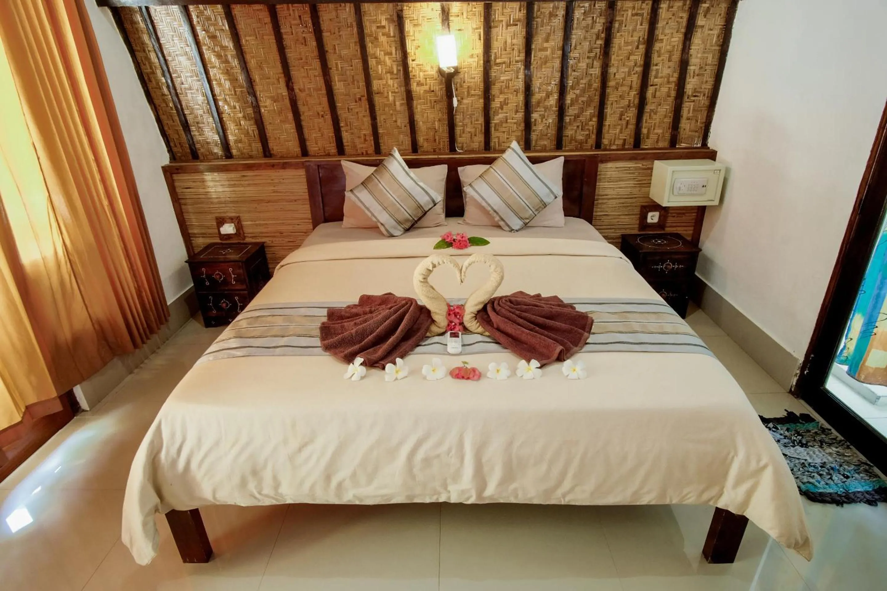Bed in Warna Beach Hotel