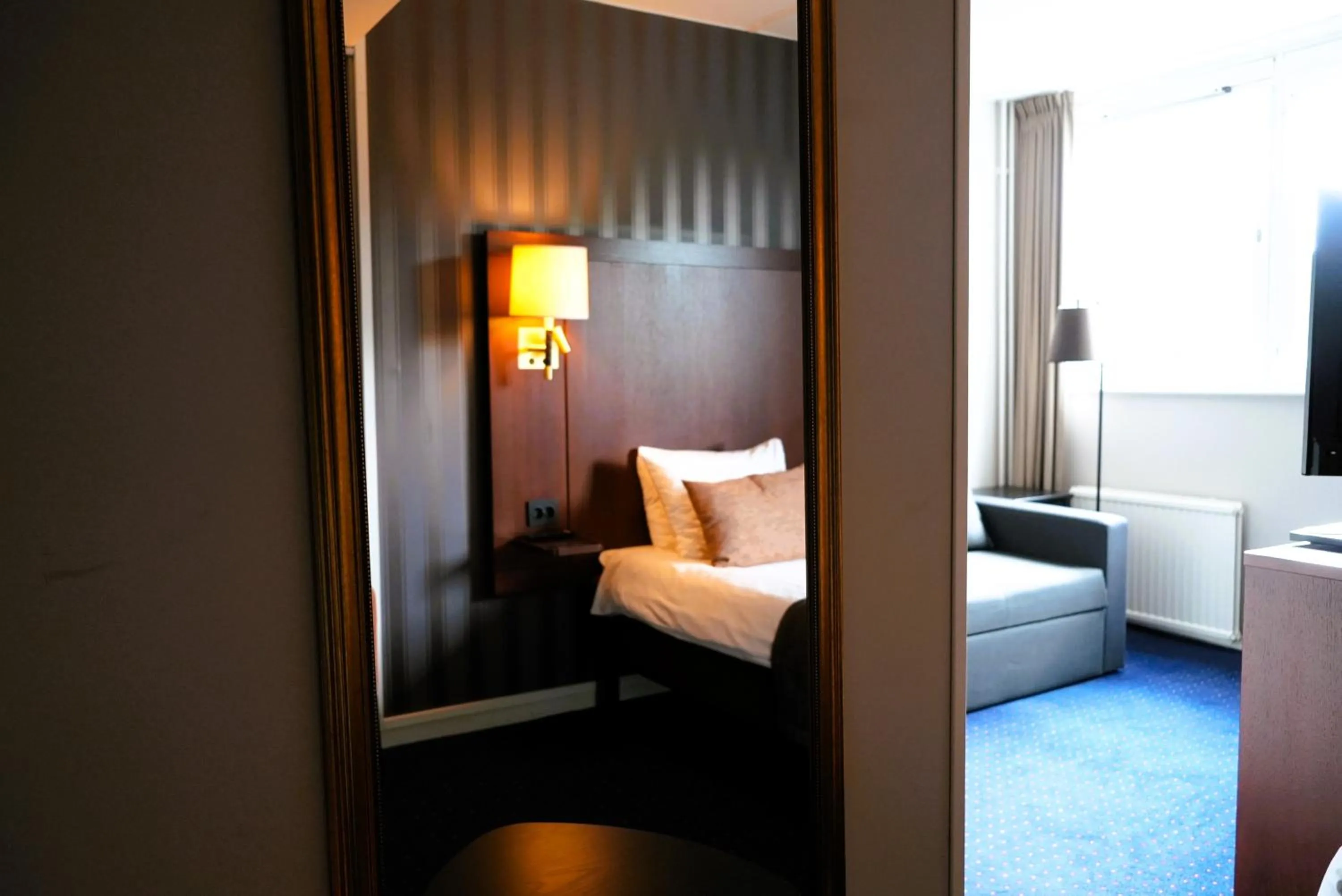 Bed in Vänerport Stadshotell i Mariestad