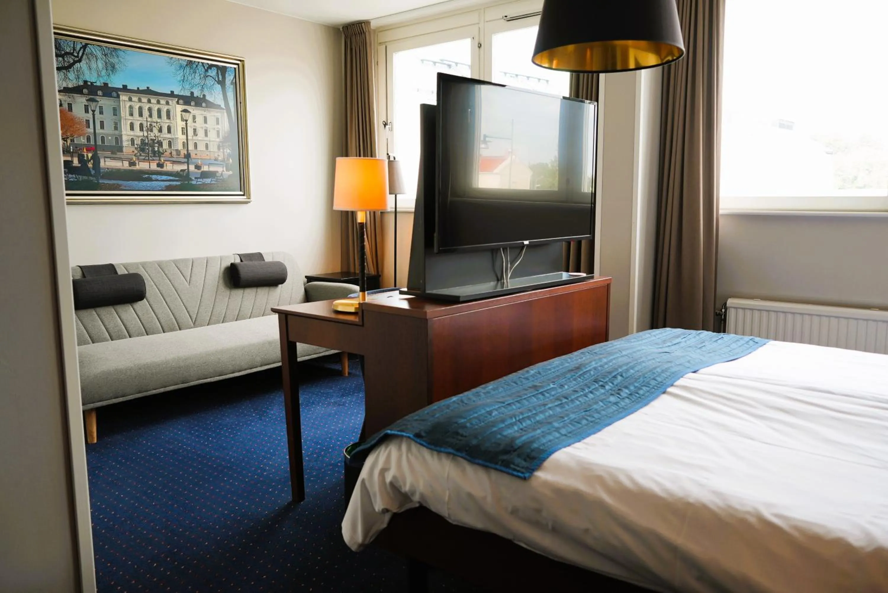 Bed in Vänerport Stadshotell i Mariestad