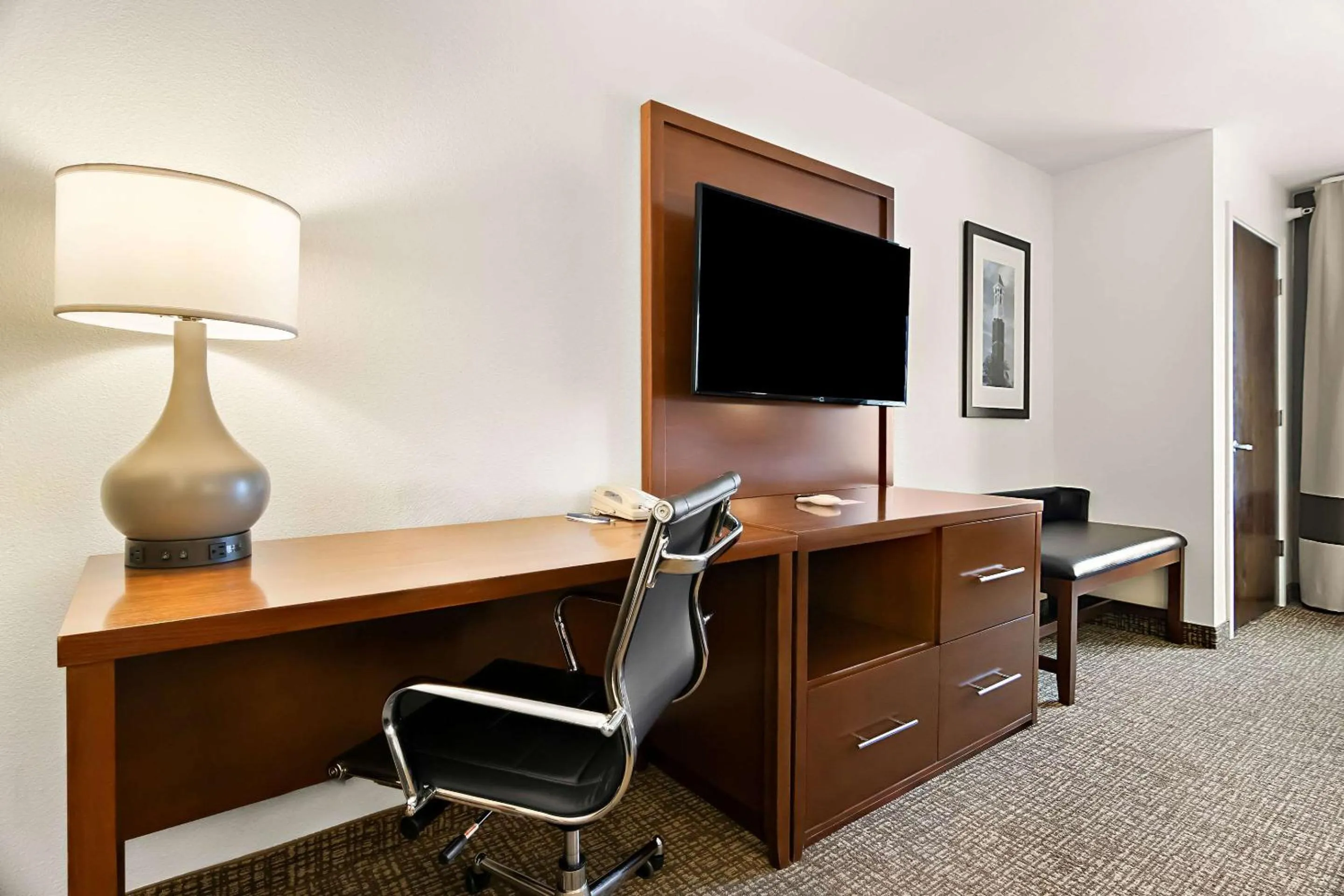 Bedroom in Comfort Suites Rensselaer near Fair Oaks