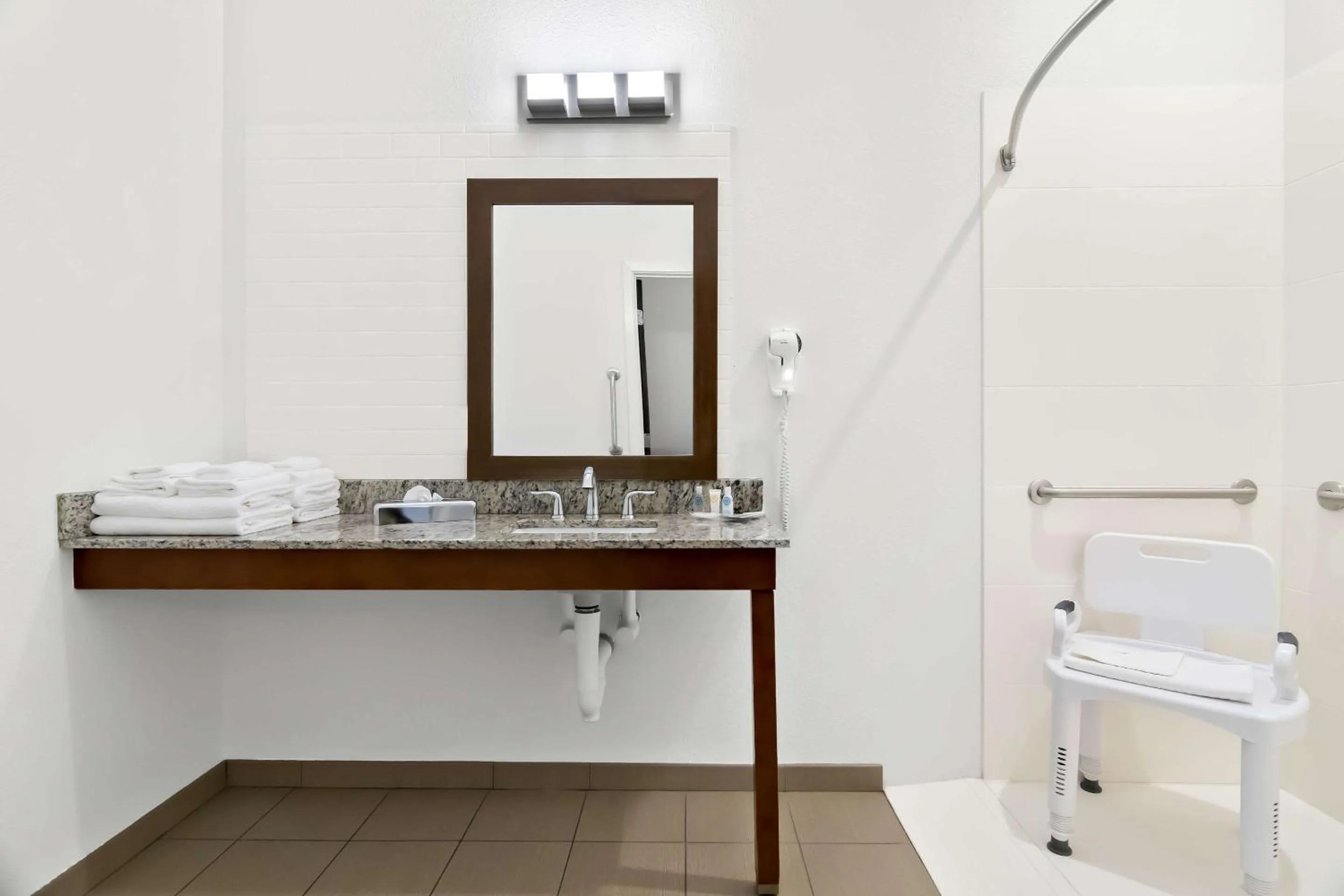 Bedroom in Comfort Suites Rensselaer near Fair Oaks