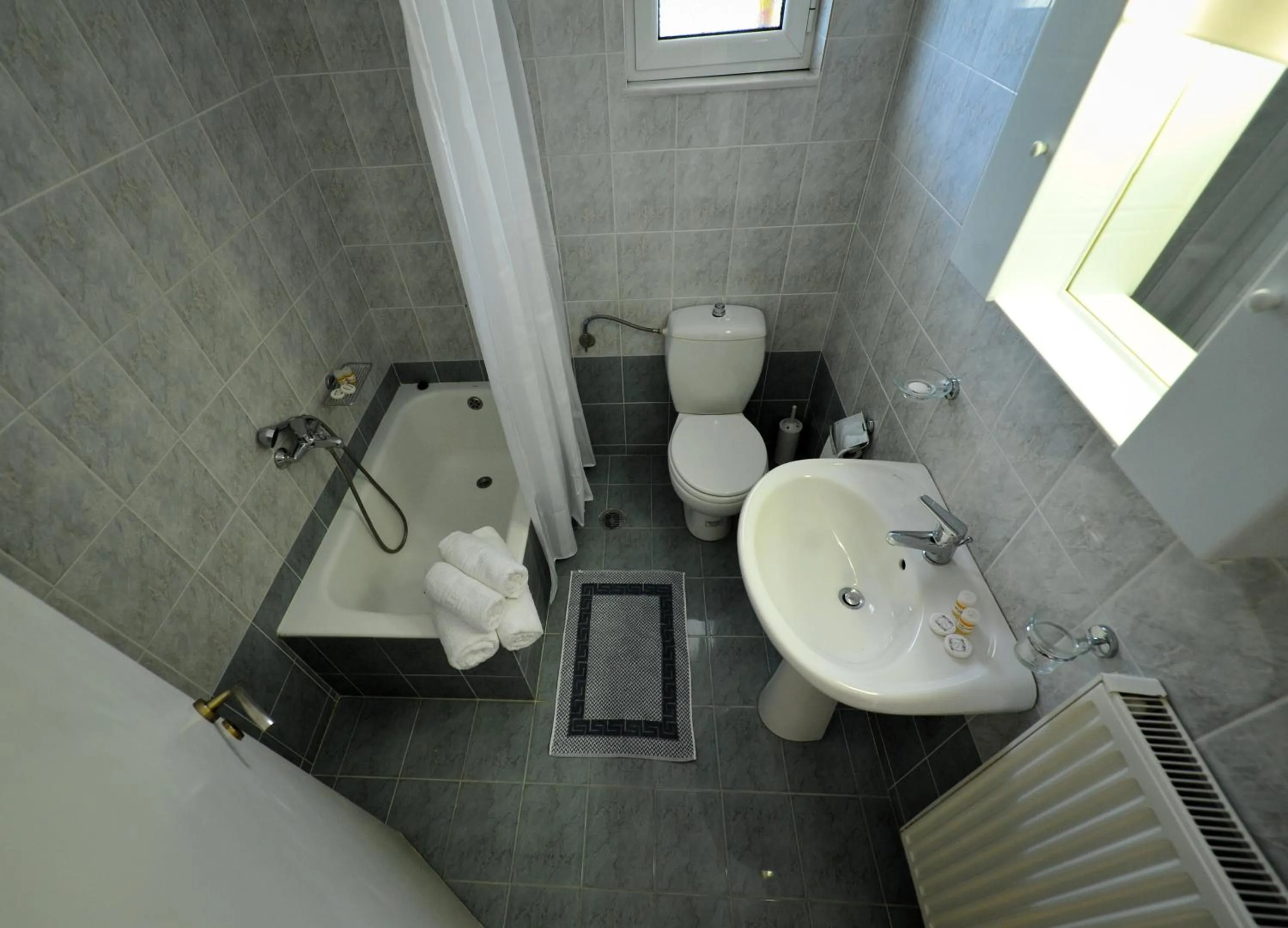 Toilet in Verga Apartments & Suites