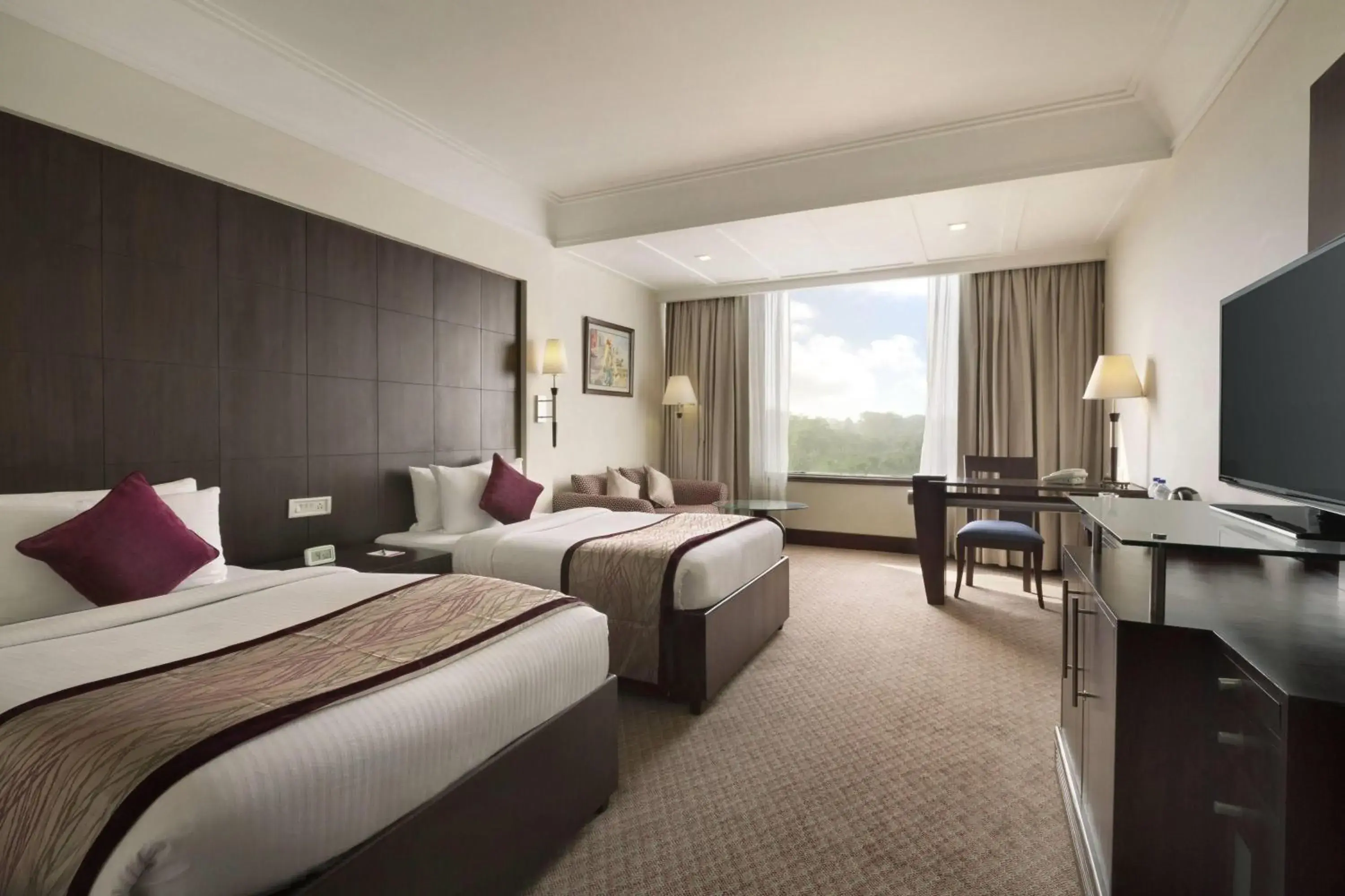 Photo of the whole room, Bed in Ramada Plaza by Wyndham JHV Varanasi Photo of the whole room, Bed in Ramada Plaza by Wyndham JHV Varanasi